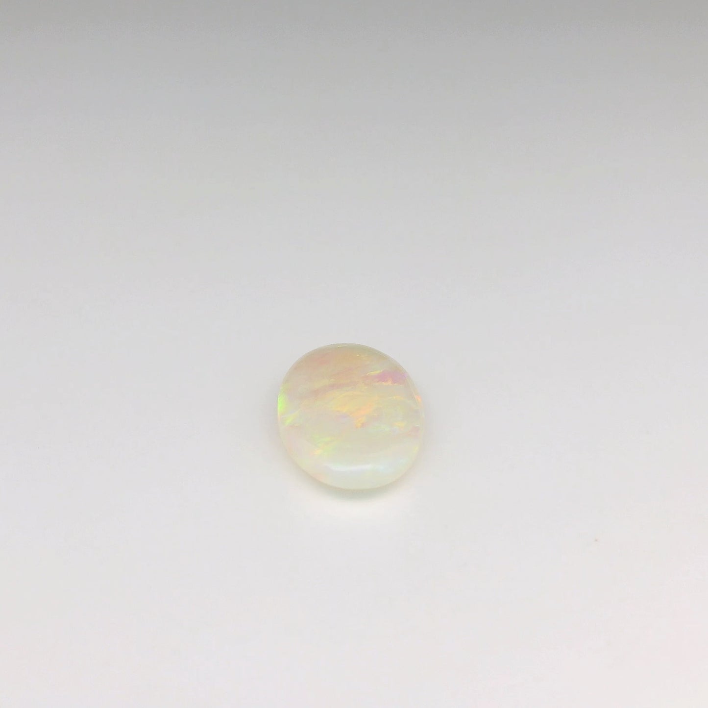 3.21ct Orange, Green Opal Ring