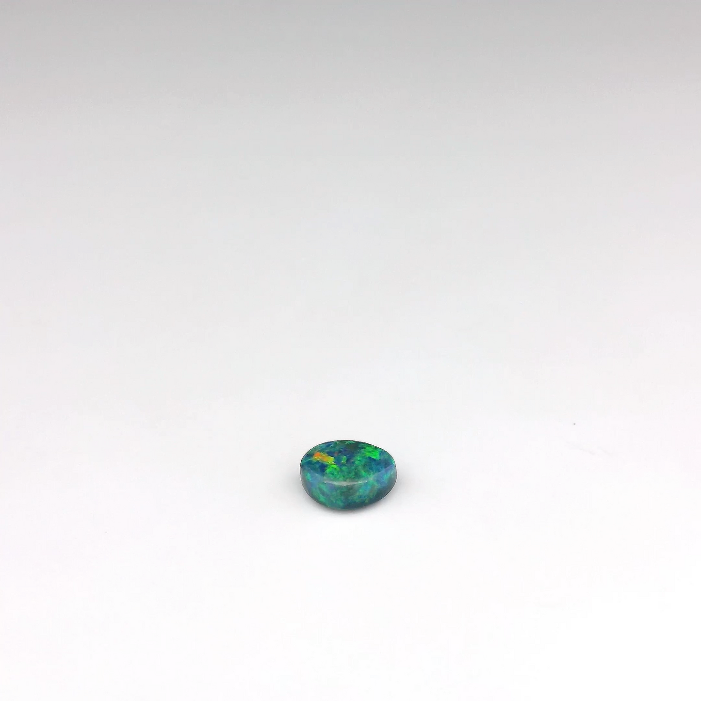 0.45ct Green, Orange Opal Gemstone