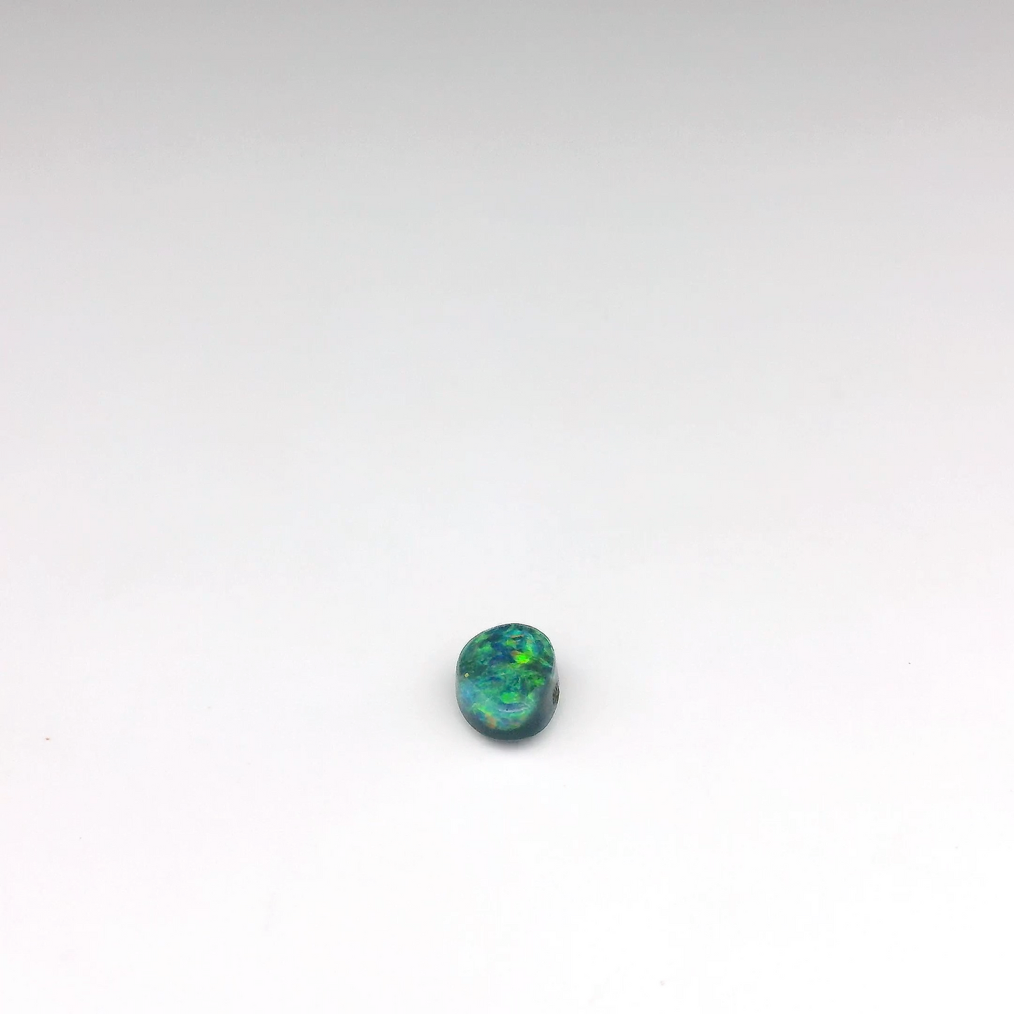 0.45ct Green, Orange Opal Gemstone