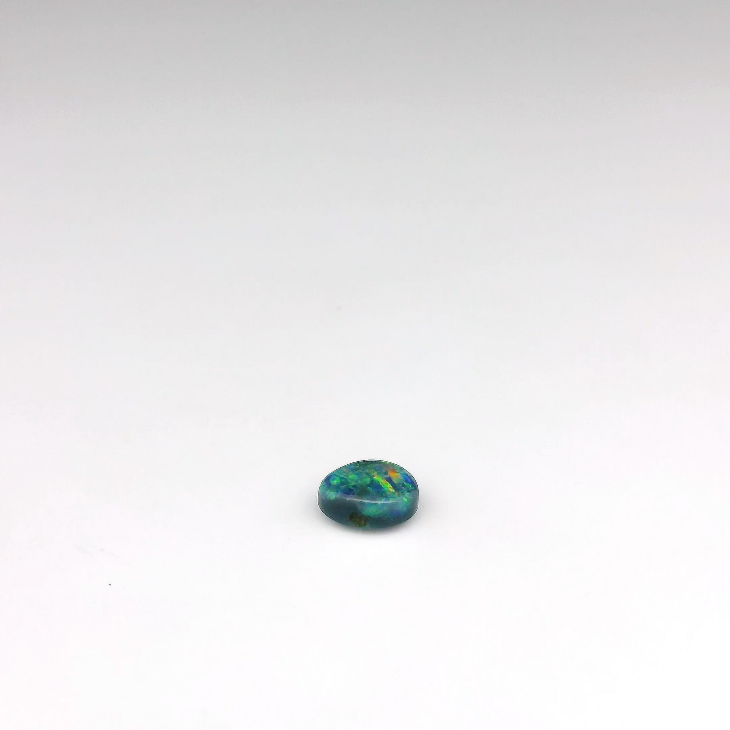 0.45ct Green, Orange Opal Gemstone