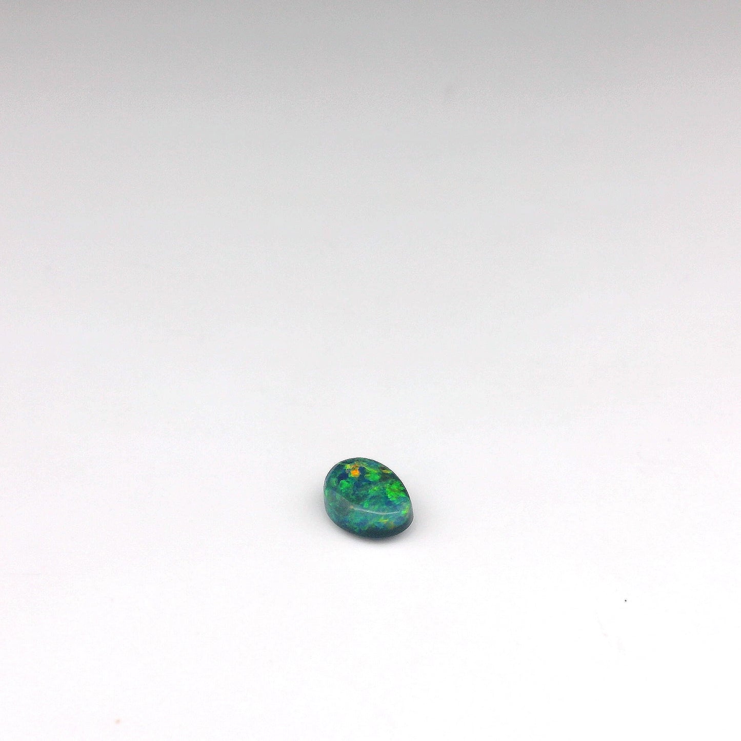 0.45ct Green, Orange Opal Gemstone