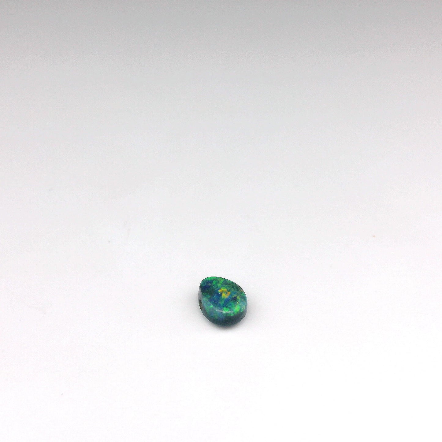 0.45ct Green, Orange Opal Gemstone