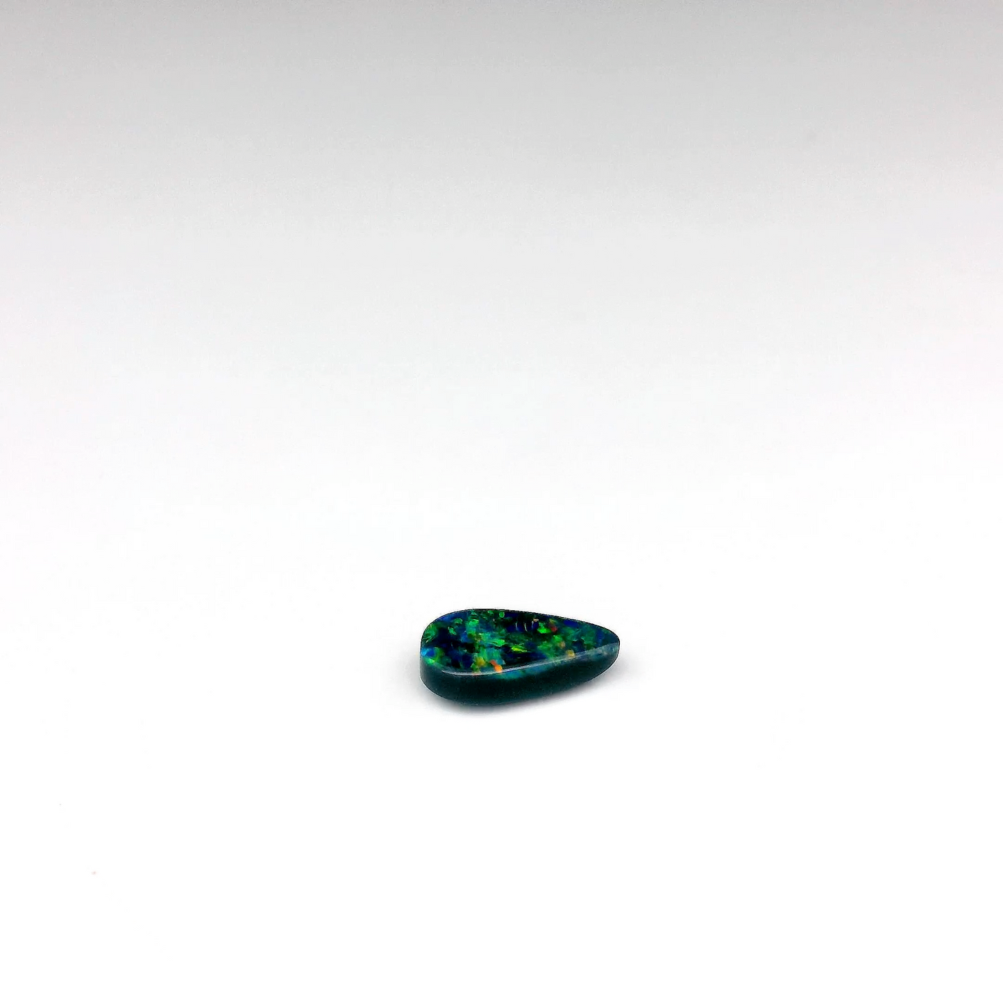 0.32ct Green, Orange Opal Gemstone