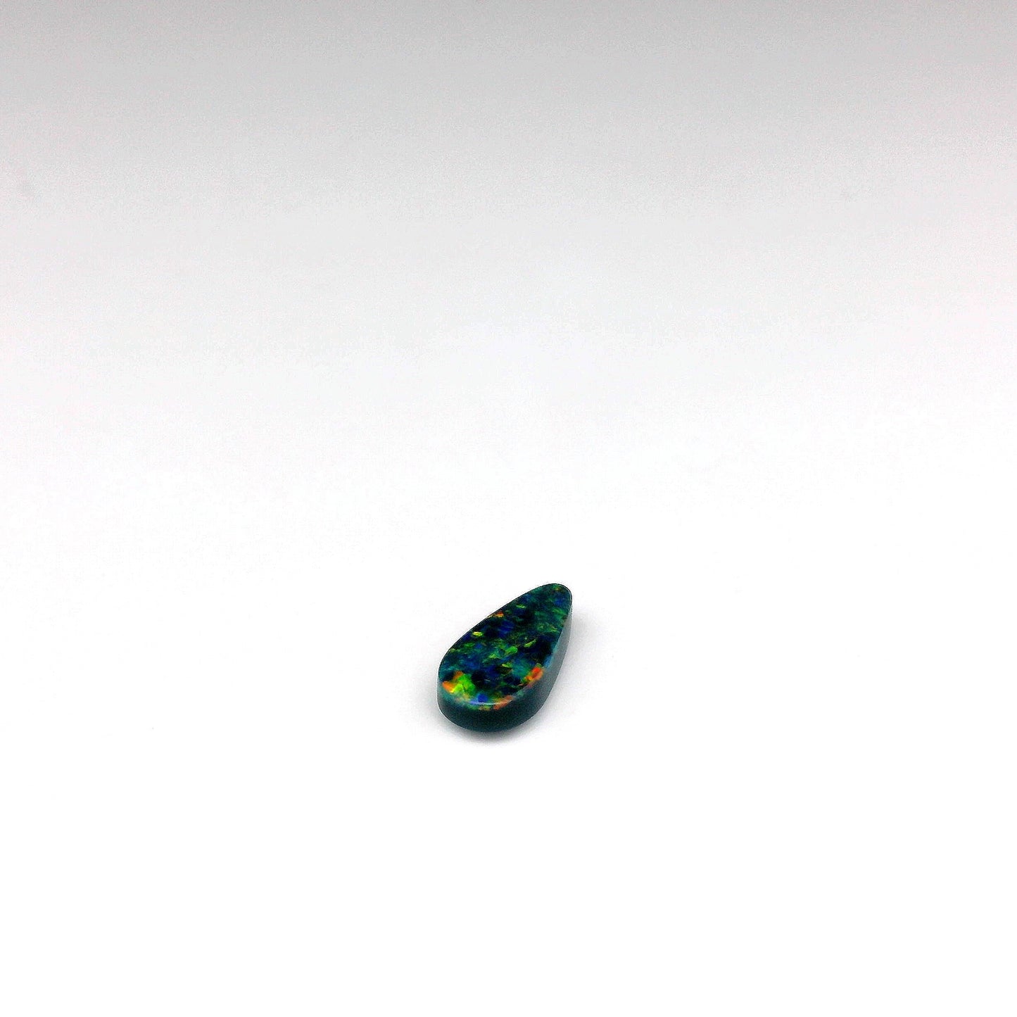 0.32ct Green, Orange Opal Gemstone