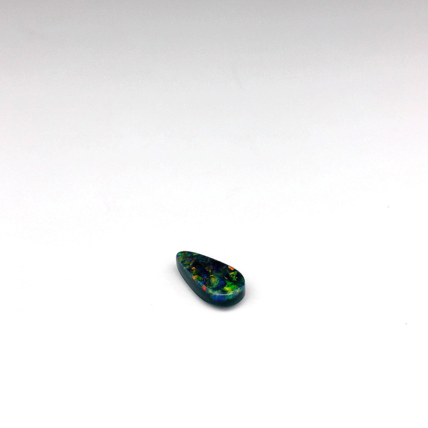 0.32ct Green, Orange Opal Gemstone