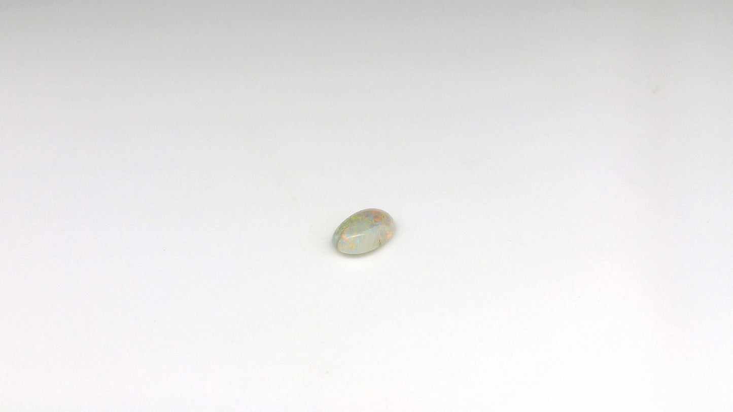0.62ct Red Multicolour Opal Gemstone