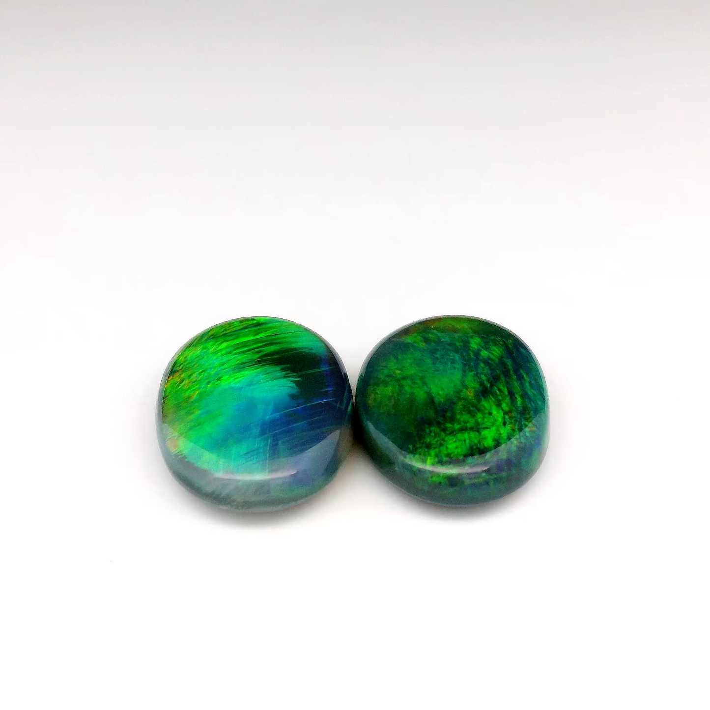 13.85ct Green, Orange Opal Gemstone Pair