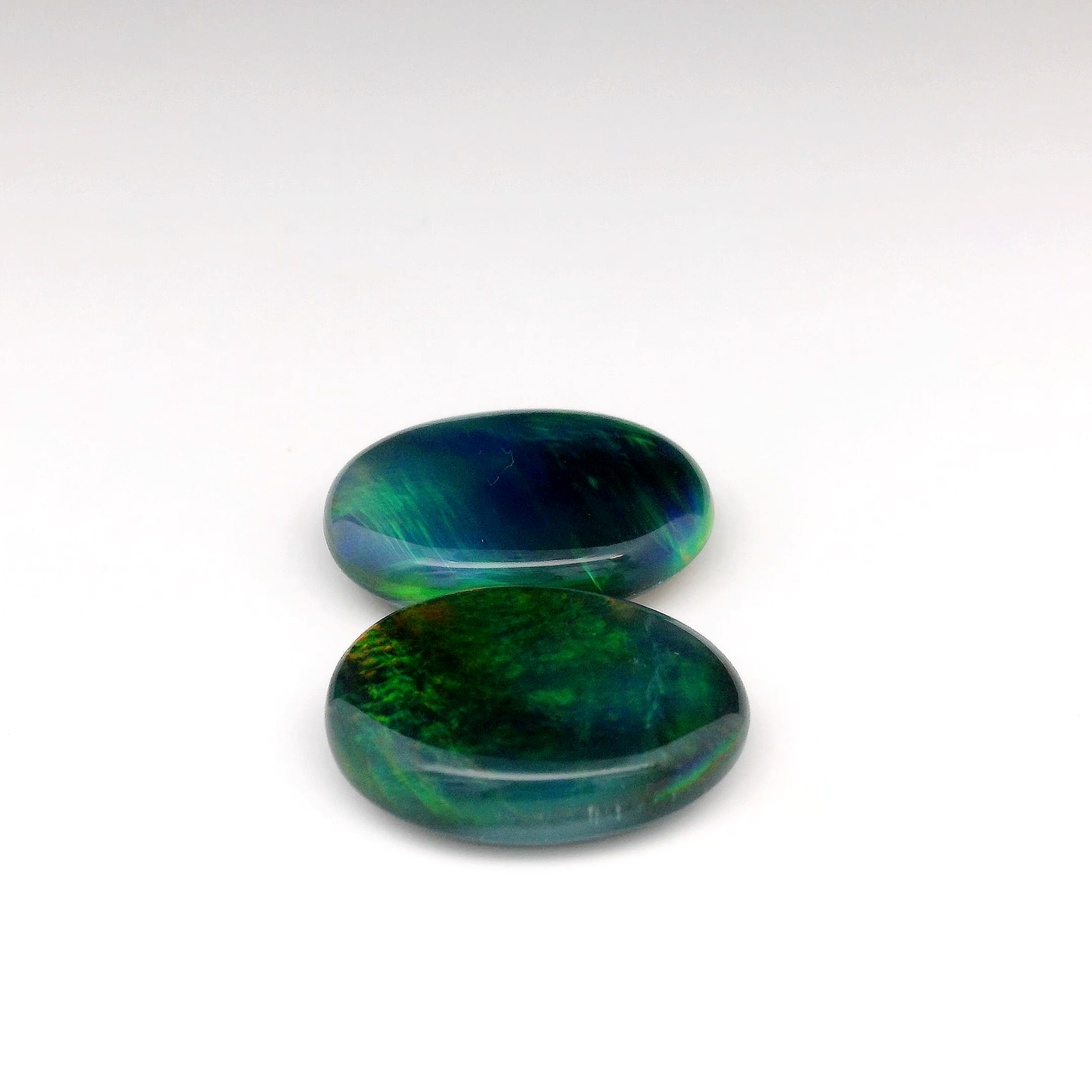 13.85ct Green, Orange Opal Gemstone Pair