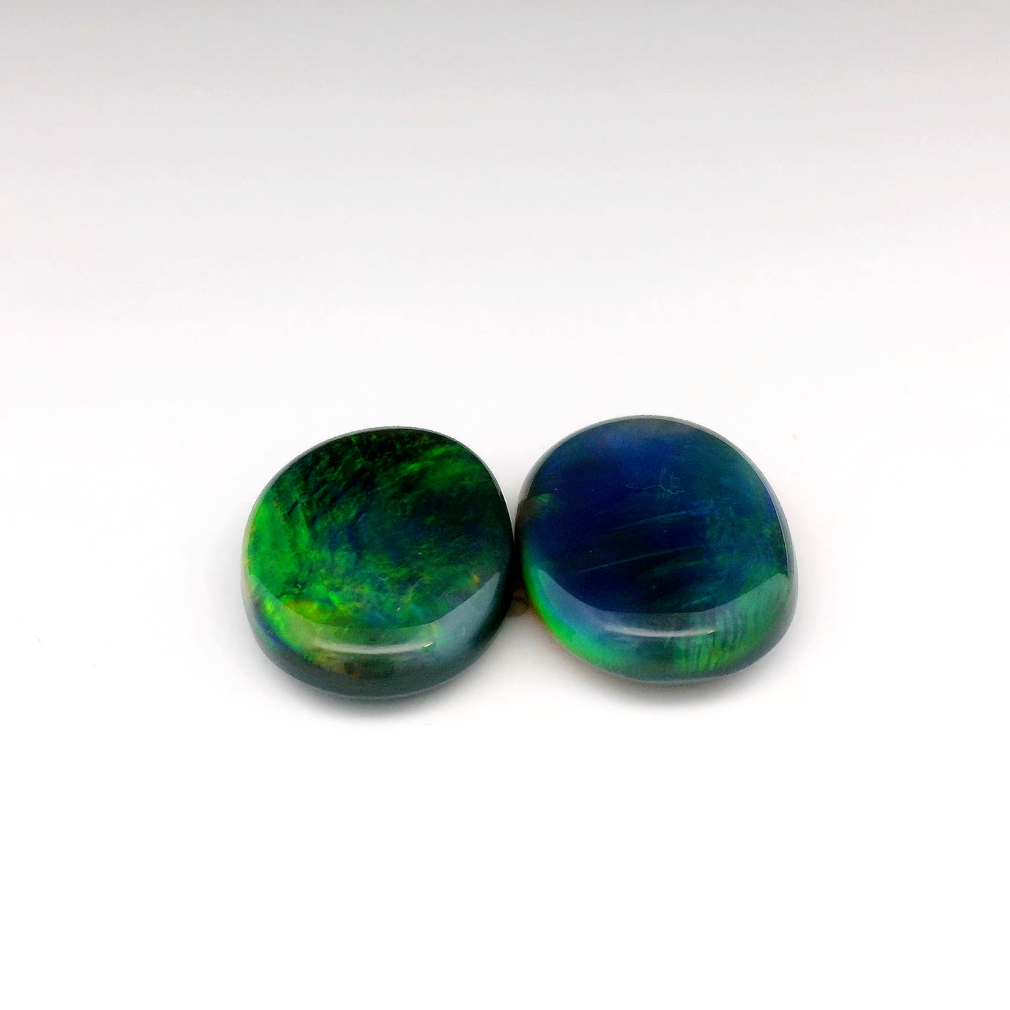 13.85ct Green, Orange Opal Gemstone Pair