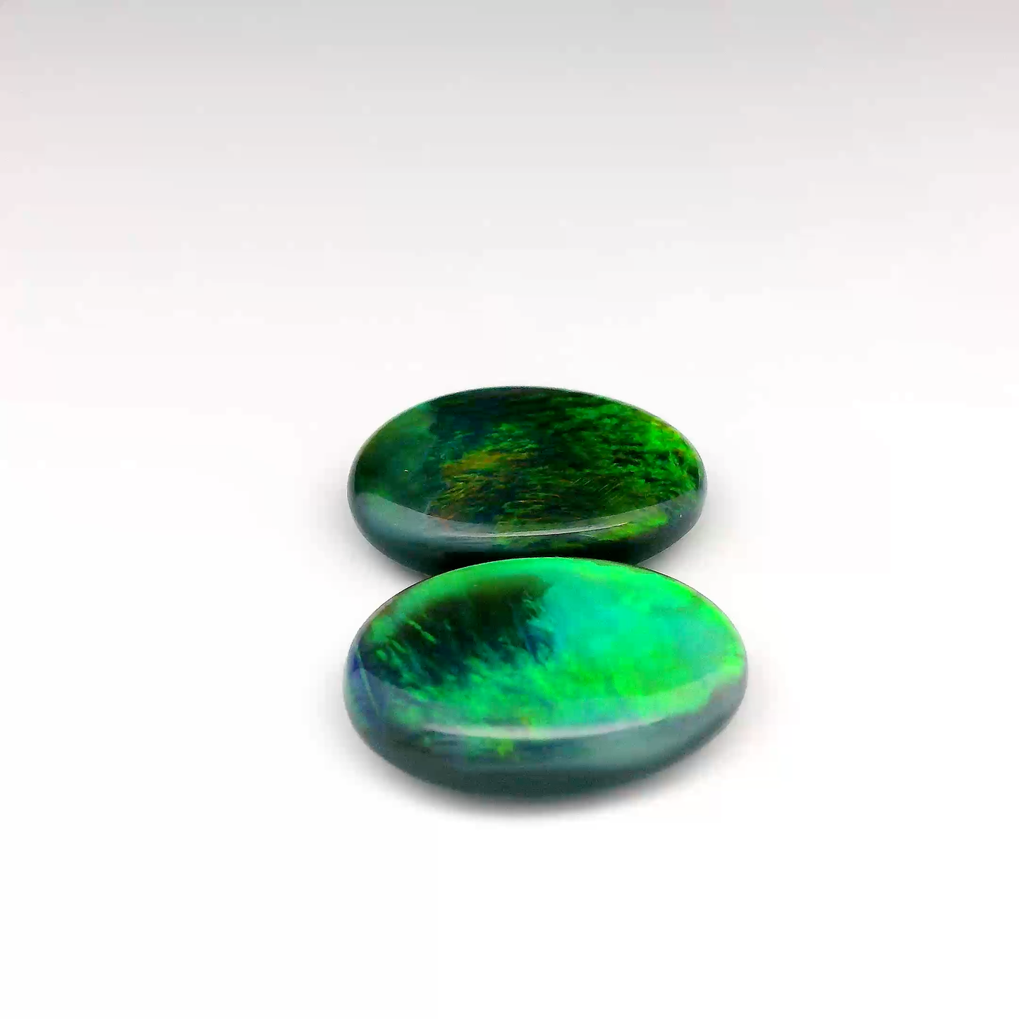 13.85ct Green, Orange Opal Gemstone Pair