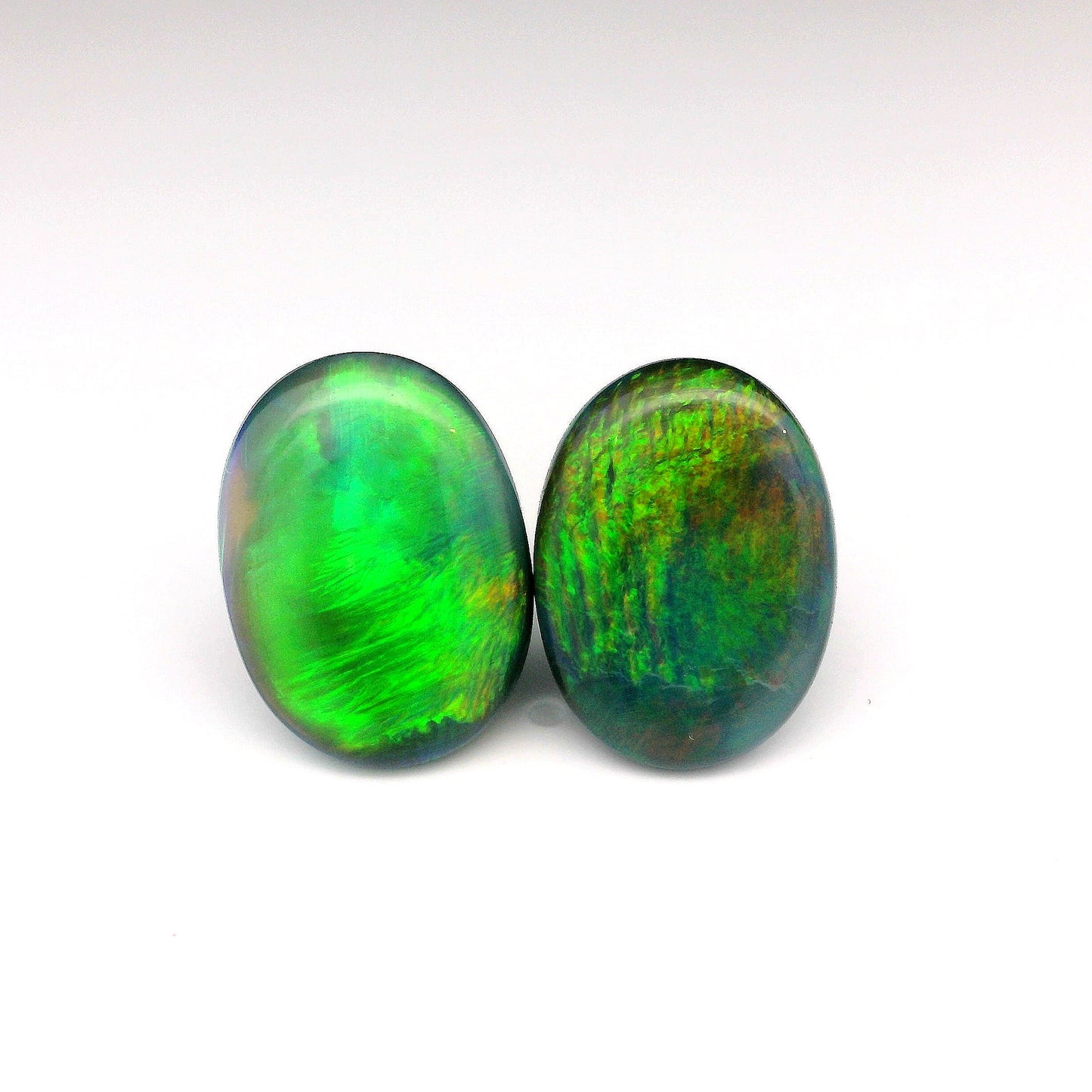 13.85ct Green, Orange Opal Gemstone Pair