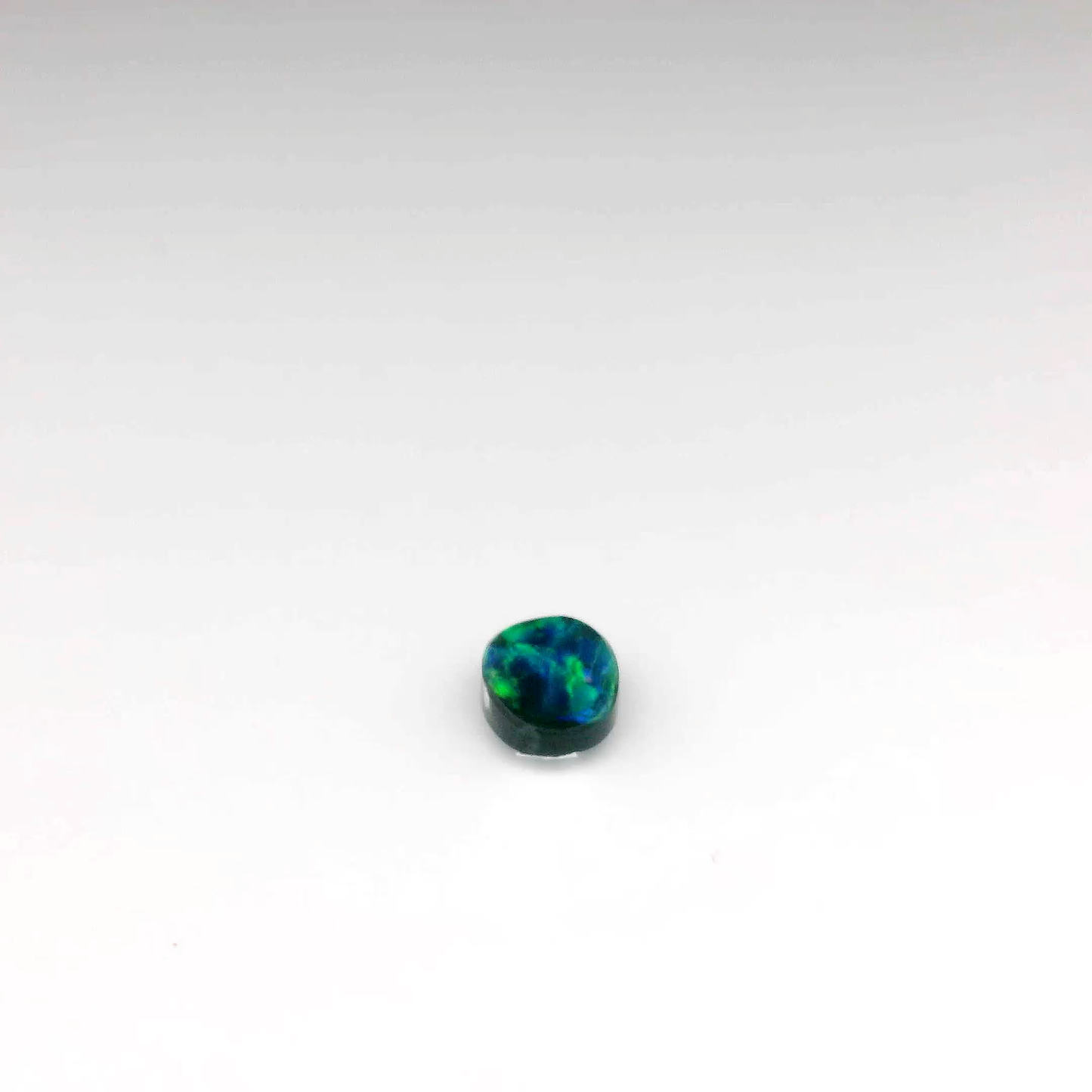 0.91ct Green Multicolour Opal Gemstone