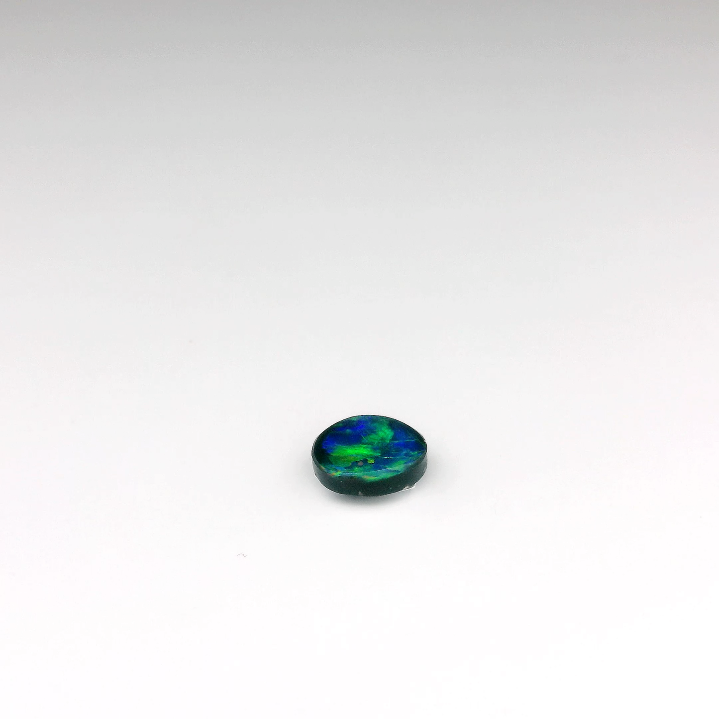 0.91ct Green Multicolour Opal Gemstone