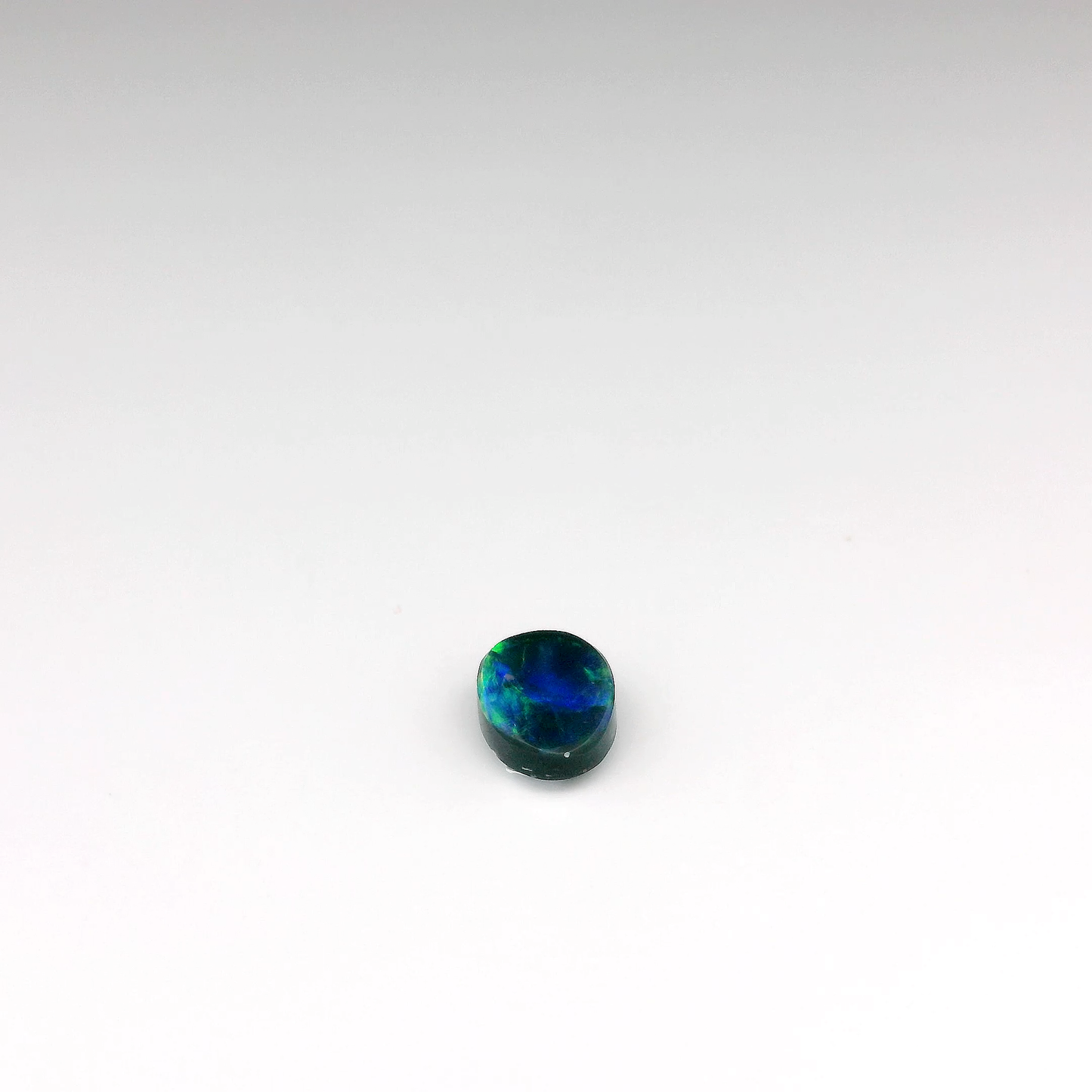0.91ct Green Multicolour Opal Gemstone