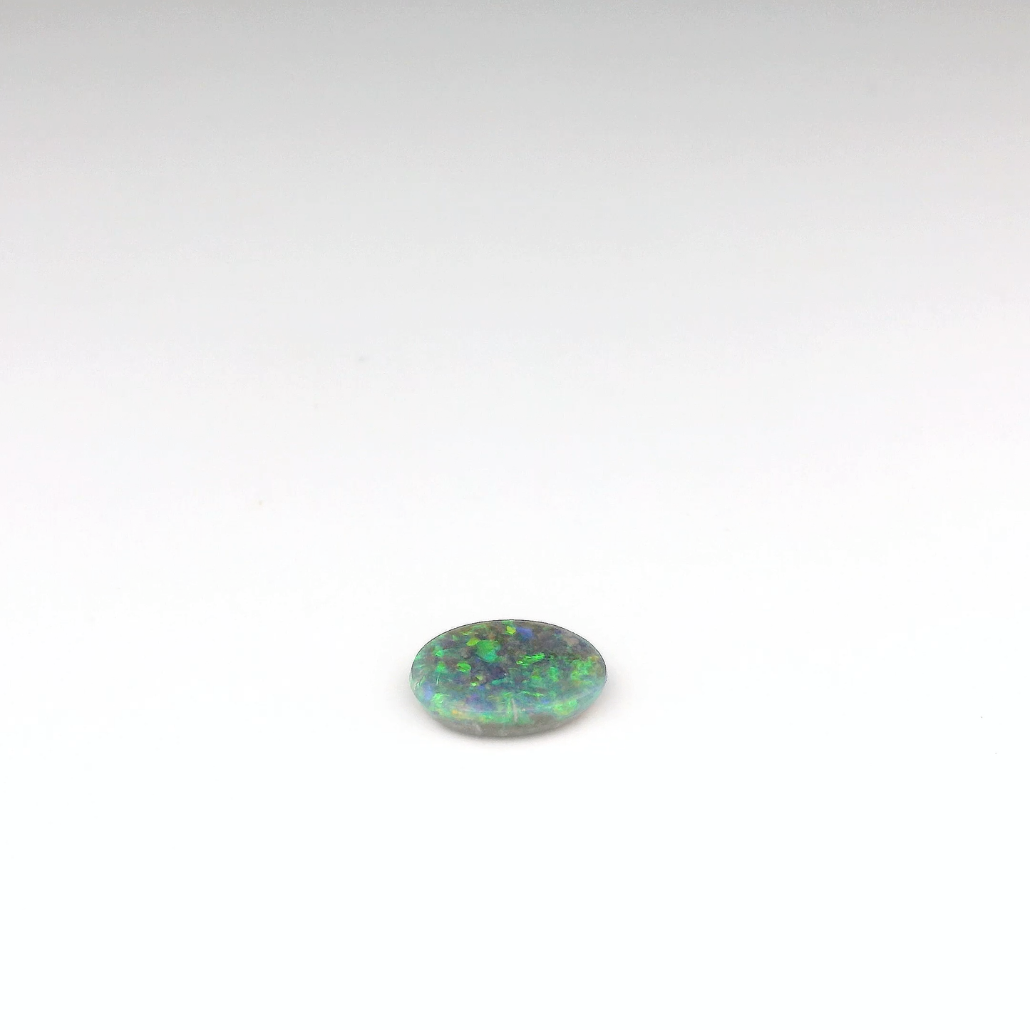0.92ct Green, Orange Opal Gemstone