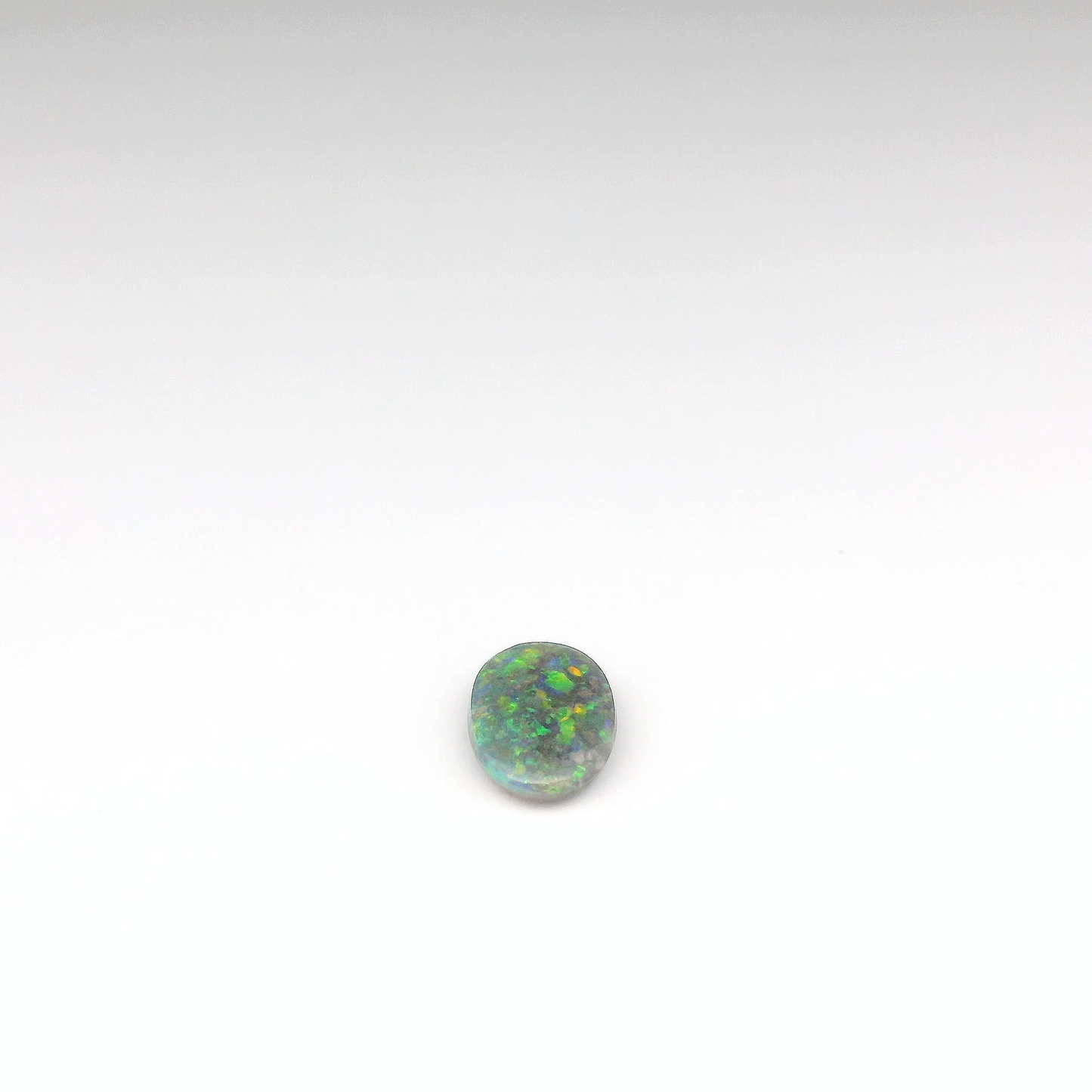 0.92ct Green, Orange Opal Gemstone