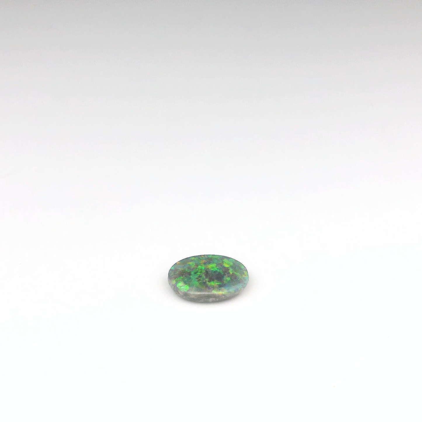 0.92ct Green, Orange Opal Gemstone