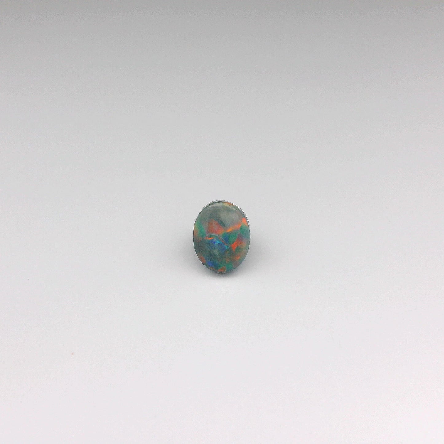 1.25ct Red, Blue Opal Gemstone