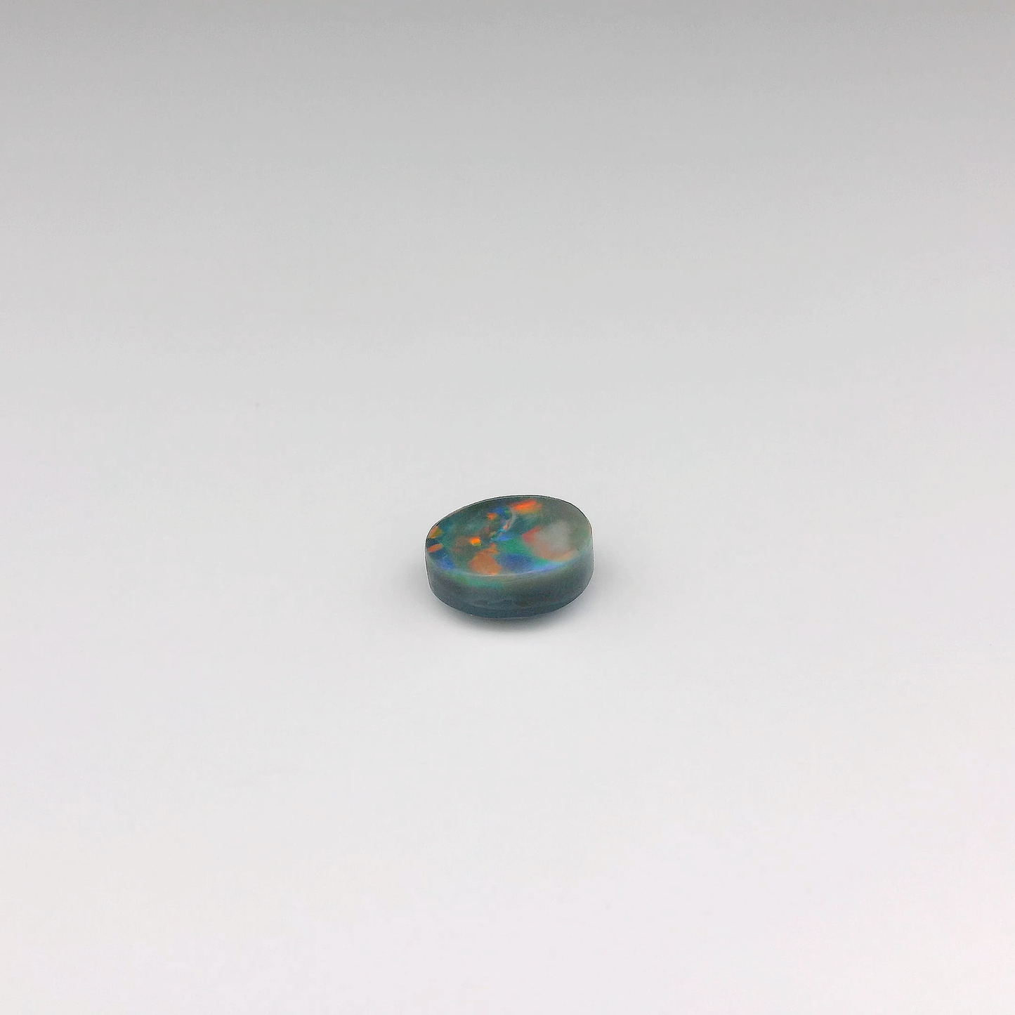 1.25ct Red, Blue Opal Gemstone