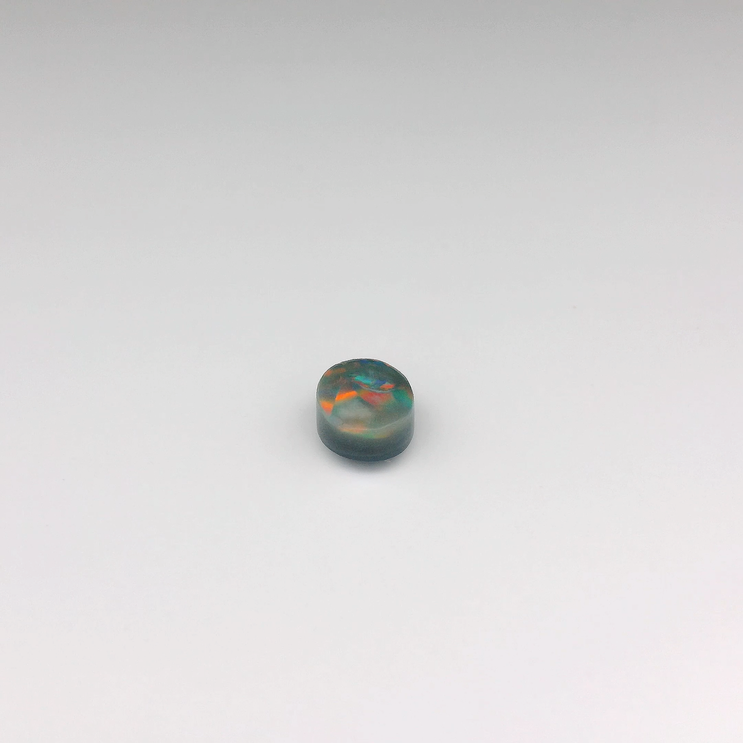 1.25ct Red, Blue Opal Gemstone