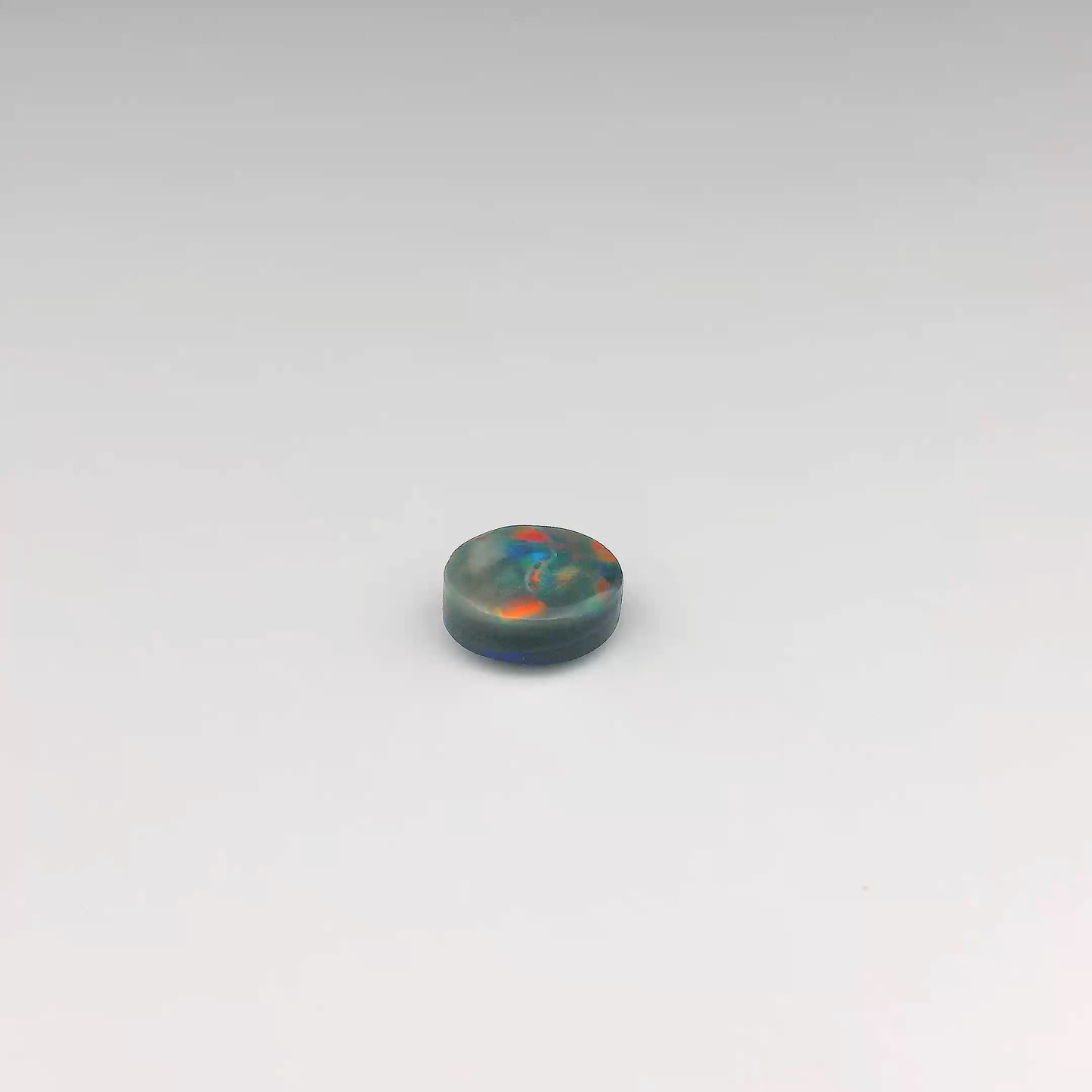 1.25ct Red, Blue Opal Gemstone