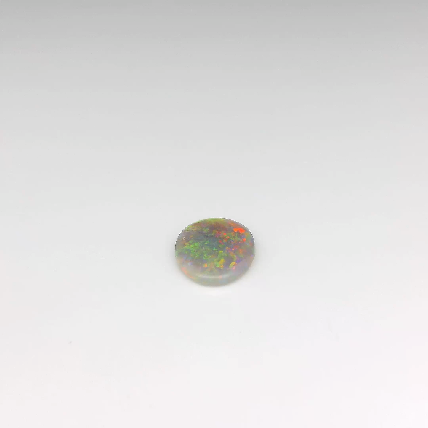 1.12ct Orange, Green Opal Gemstone