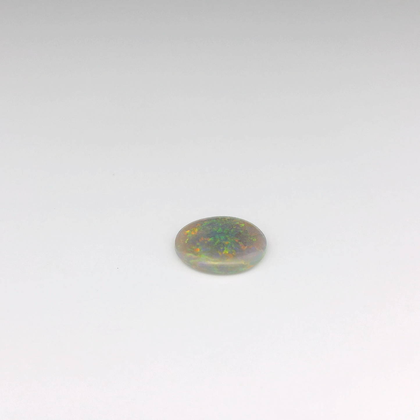 1.12ct Orange, Green Opal Gemstone