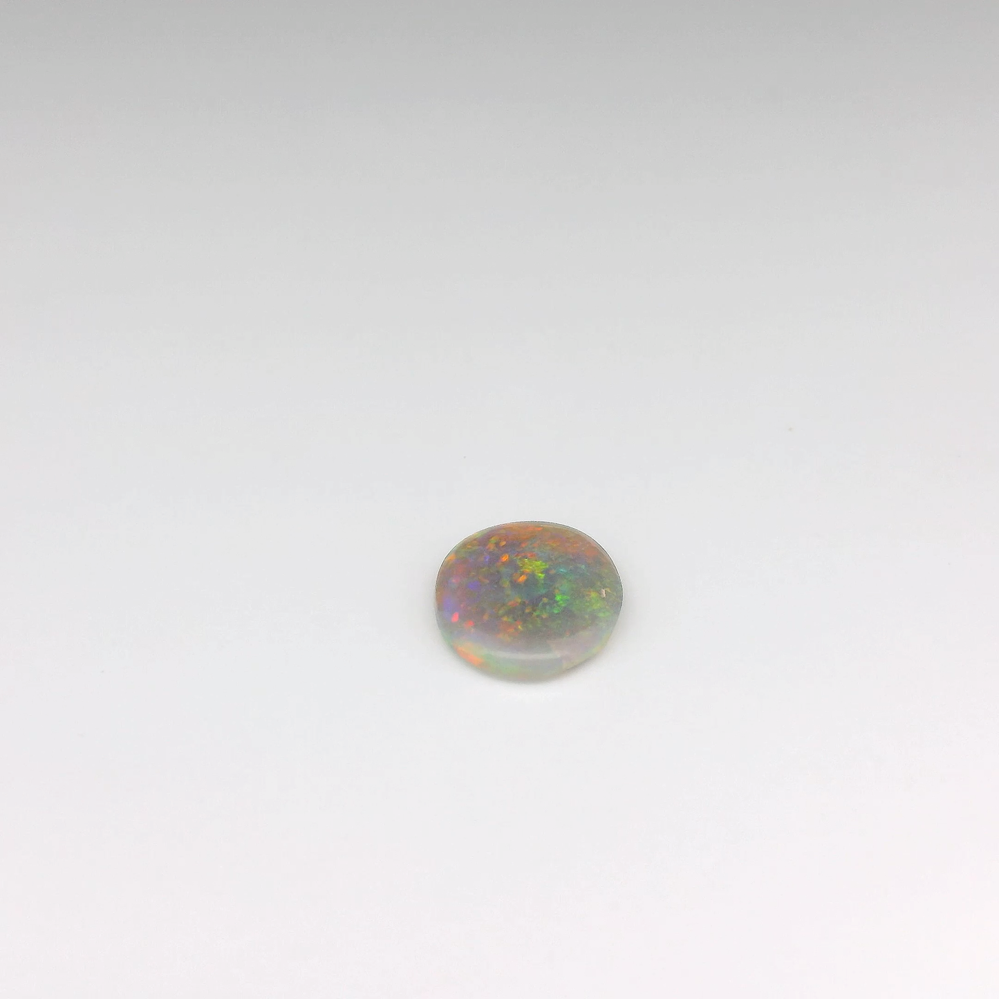 1.12ct Orange, Green Opal Gemstone