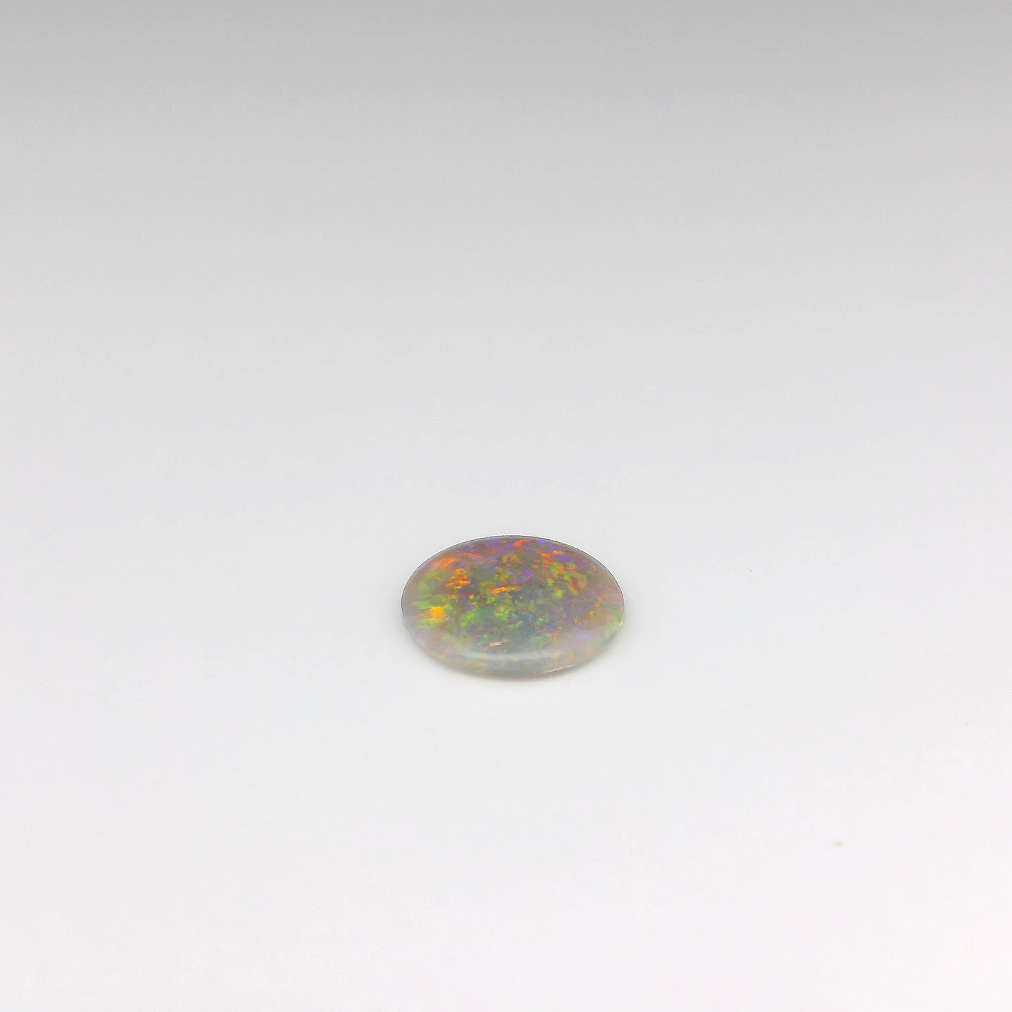 1.12ct Orange, Green Opal Gemstone