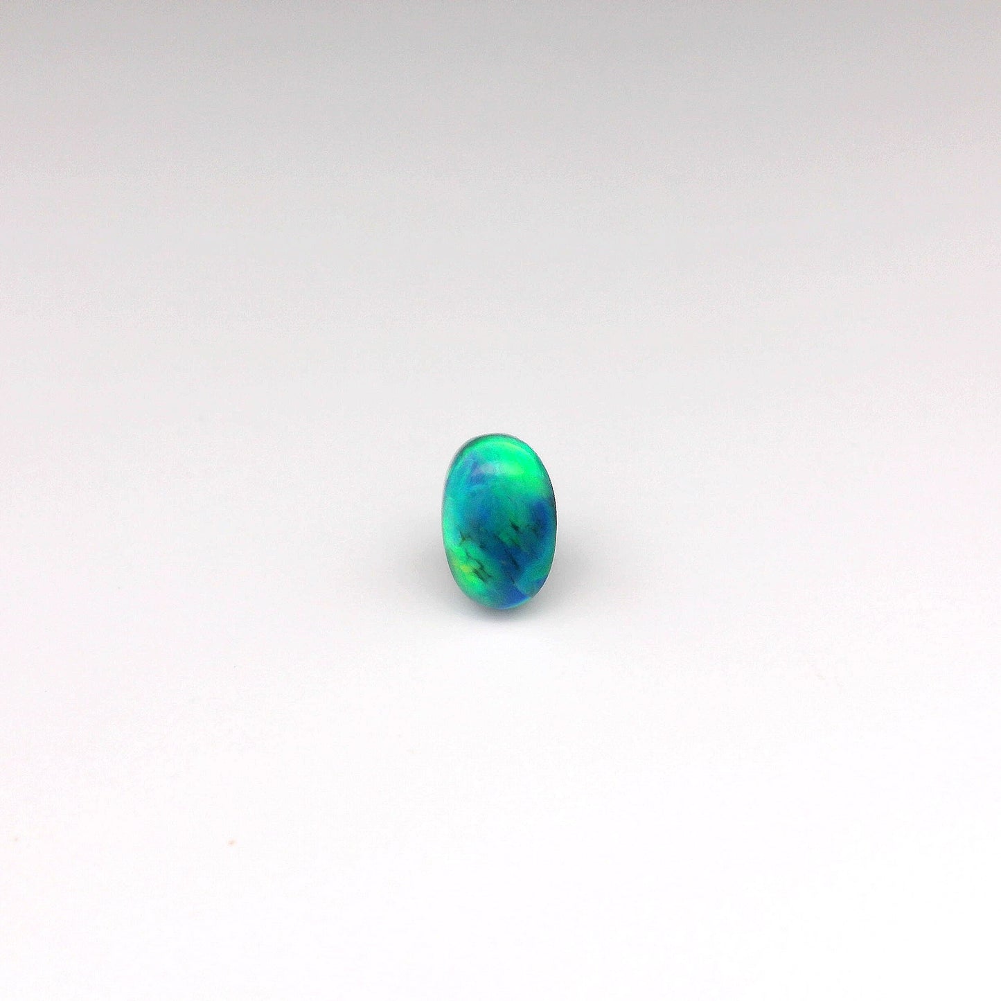 0.98ct Orange, Green Opal Gemstone
