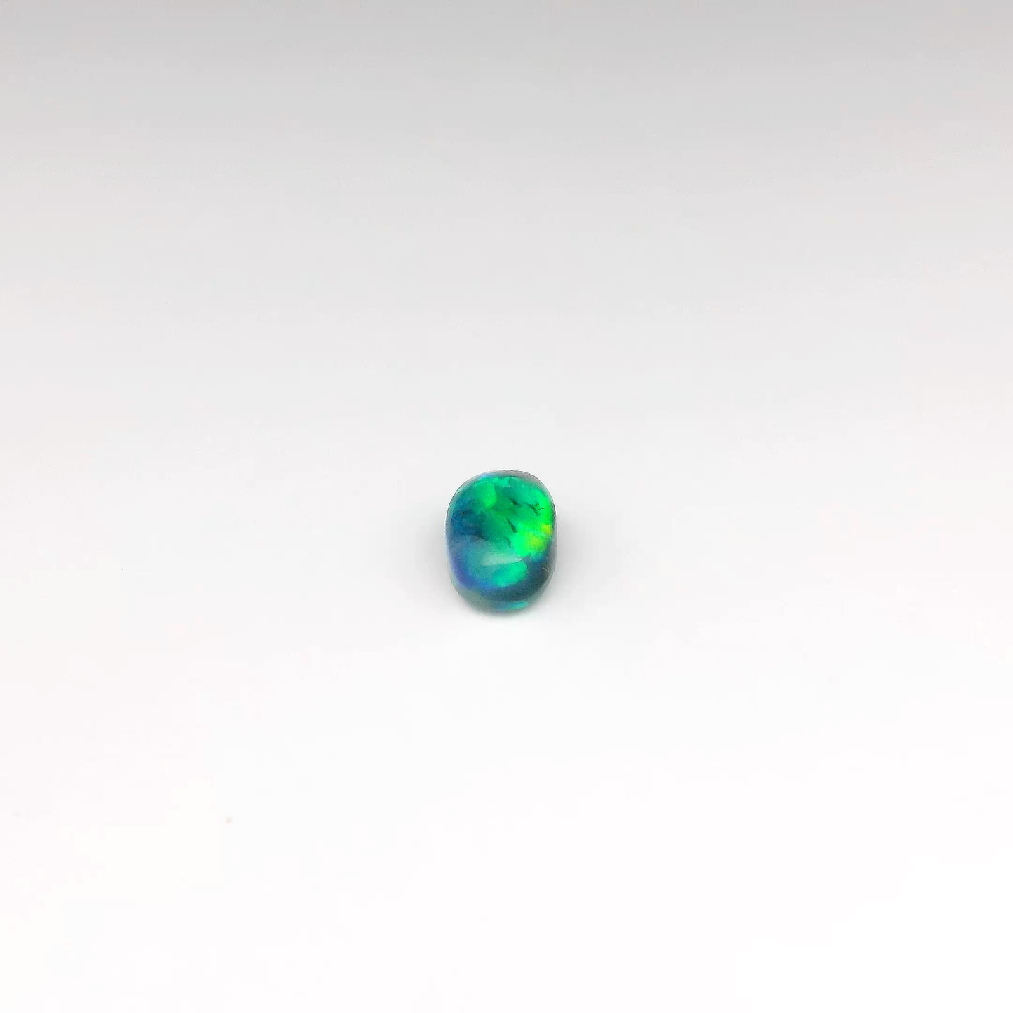 0.98ct Orange, Green Opal Gemstone