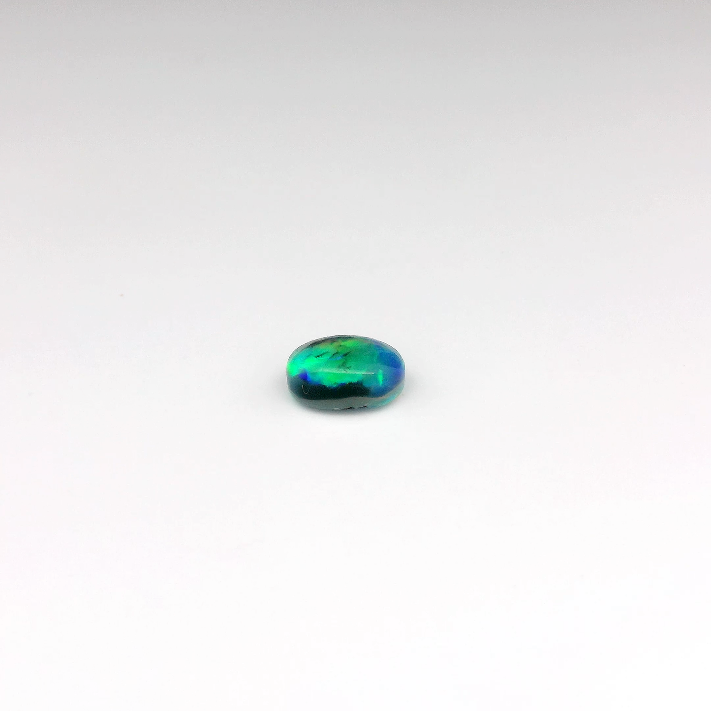 0.98ct Orange, Green Opal Gemstone