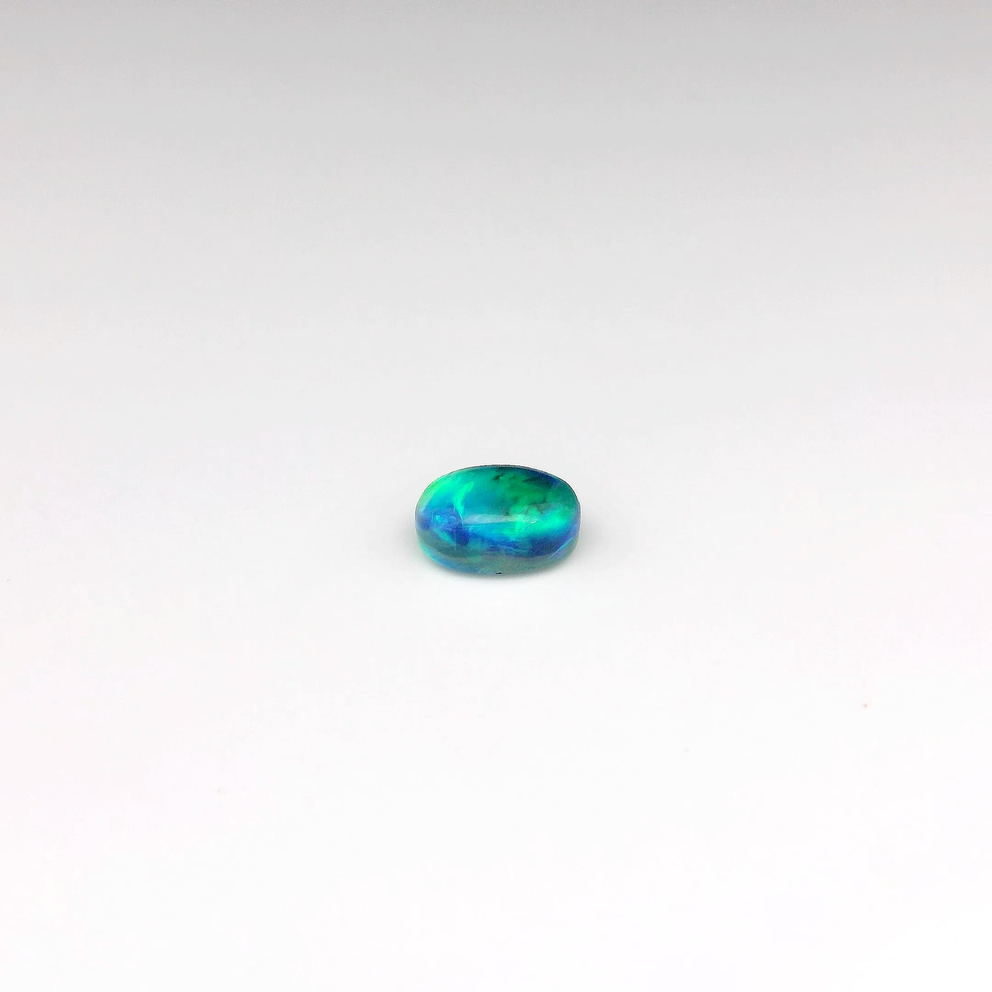 0.98ct Orange, Green Opal Gemstone