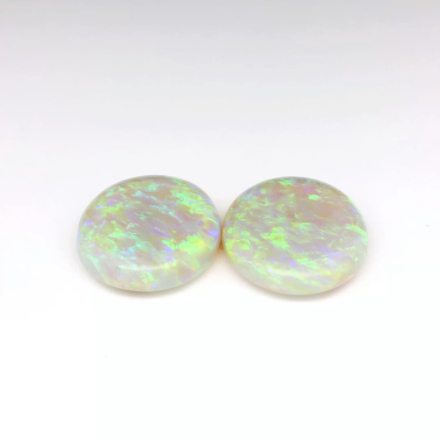 14.08ct Green, Purple Opal Gemstone Pair