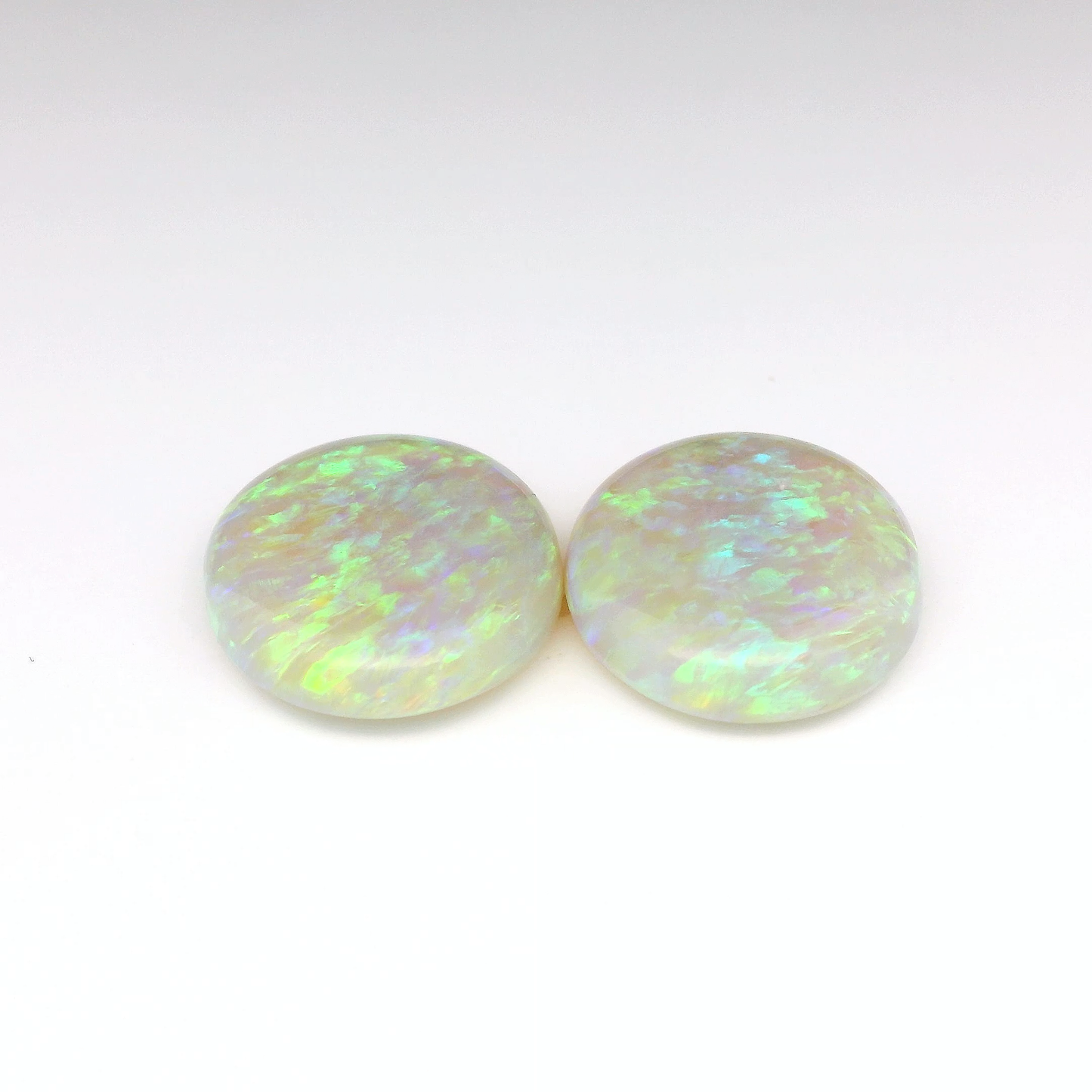 14.08ct Green, Purple Opal Gemstone Pair