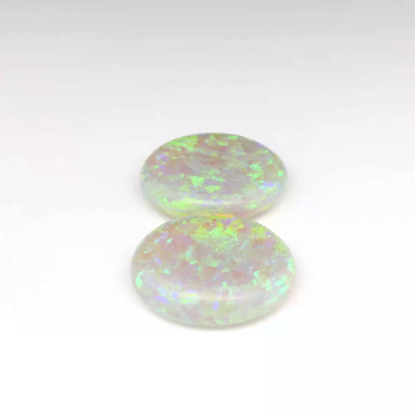 14.08ct Green, Purple Opal Gemstone Pair