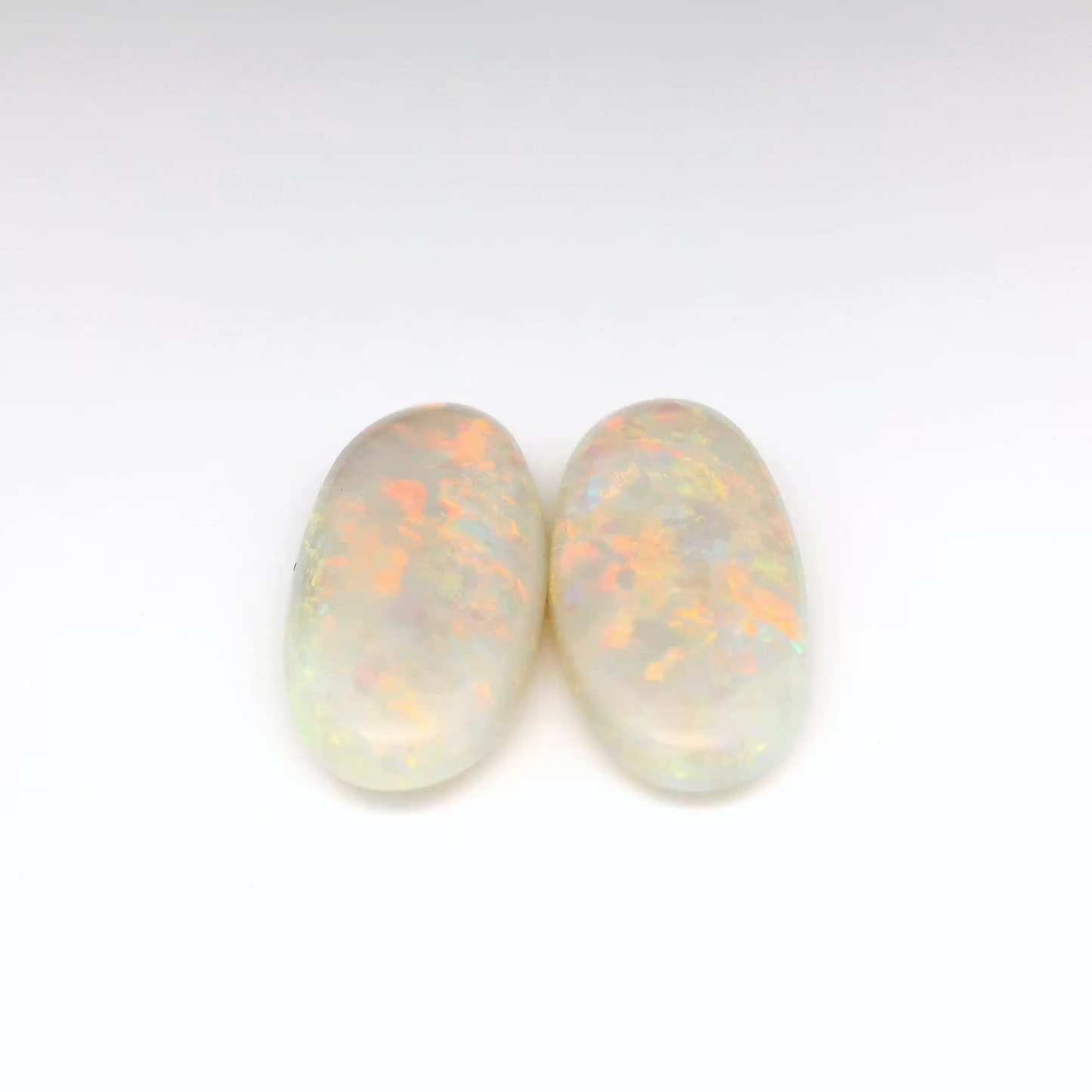 14.11ct Red Multicolour Opal Gemstone Pair
