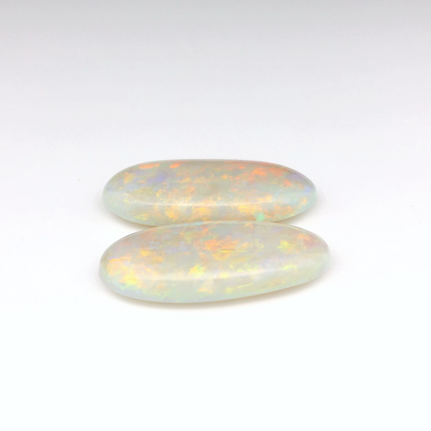 14.11ct Red Multicolour Opal Gemstone Pair