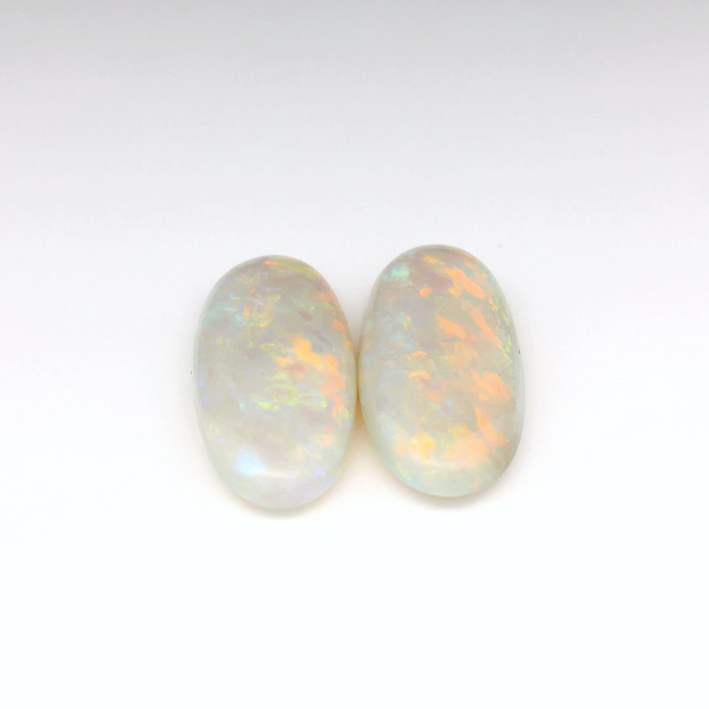 14.11ct Red Multicolour Opal Gemstone Pair