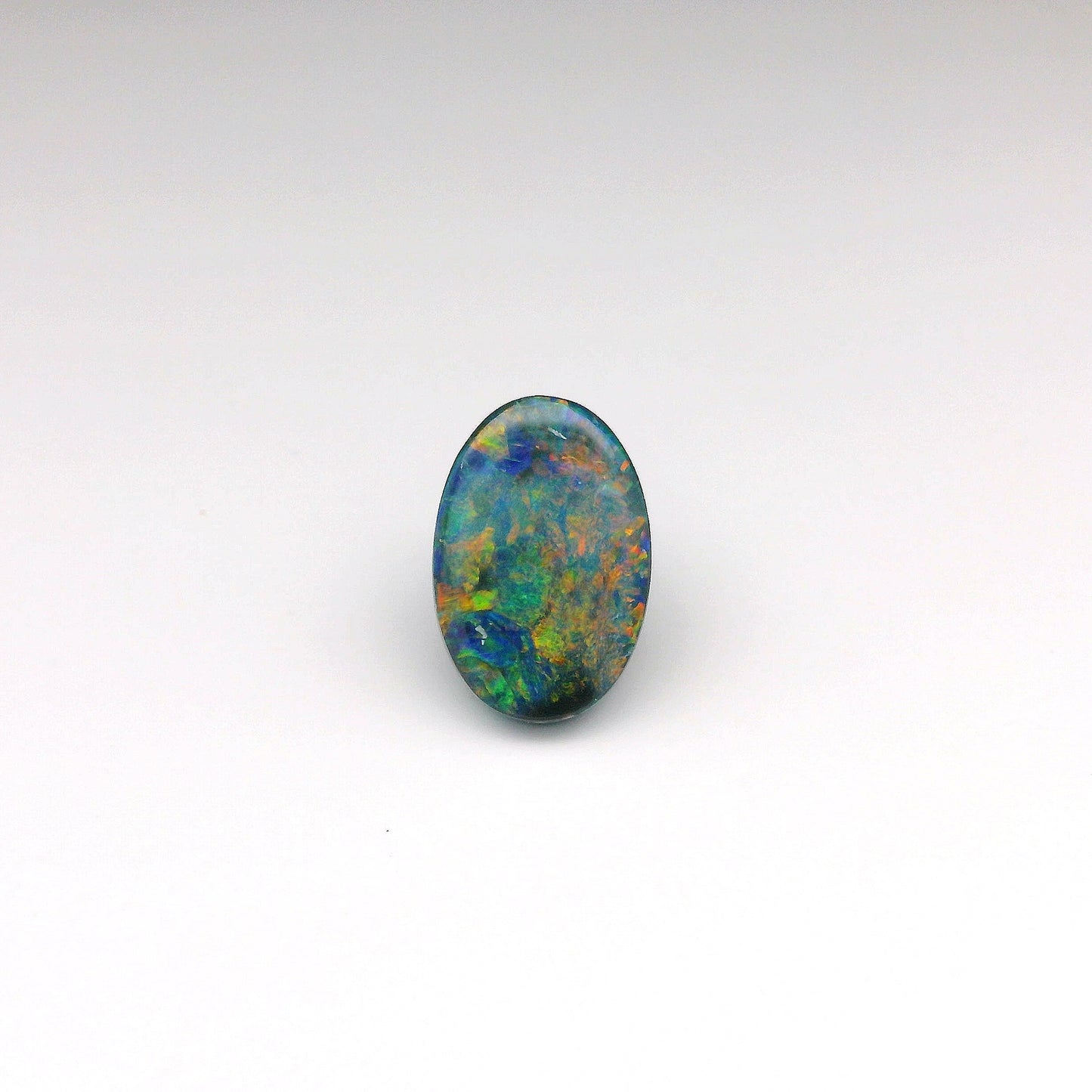 3.57ct Orange, Red Opal Gemstone