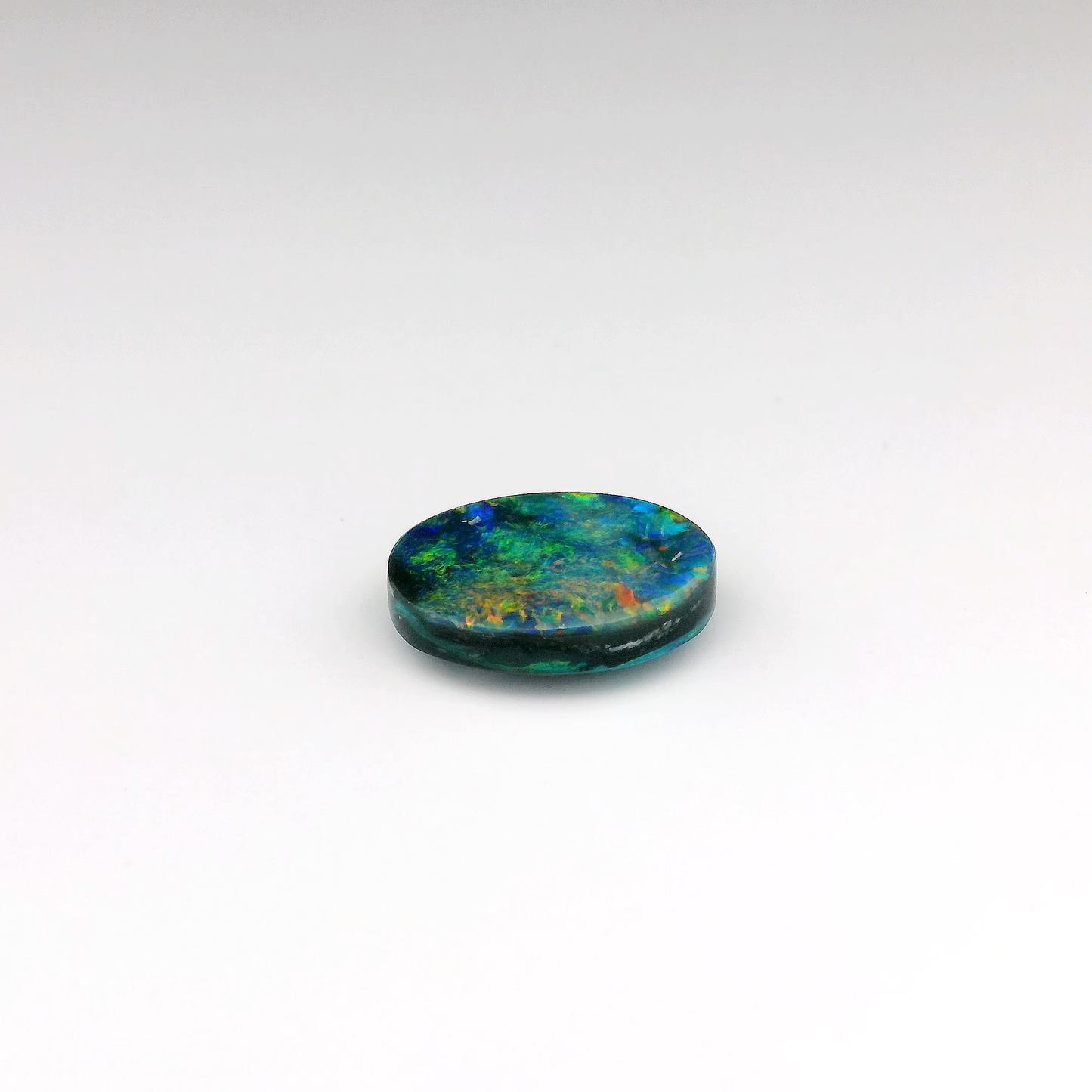 3.57ct Orange, Red Opal Gemstone