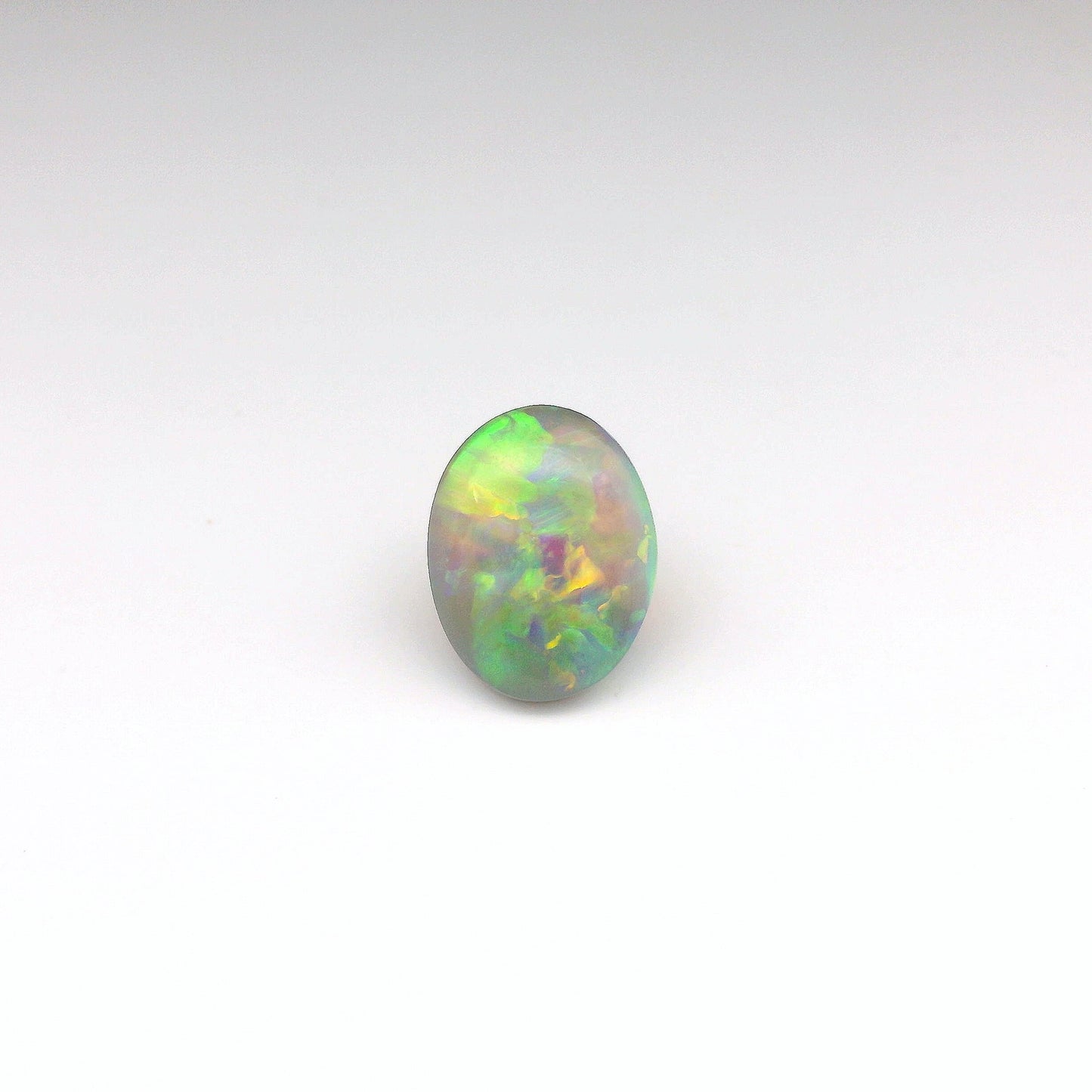 3.55ct Green, Orange Opal Gemstone