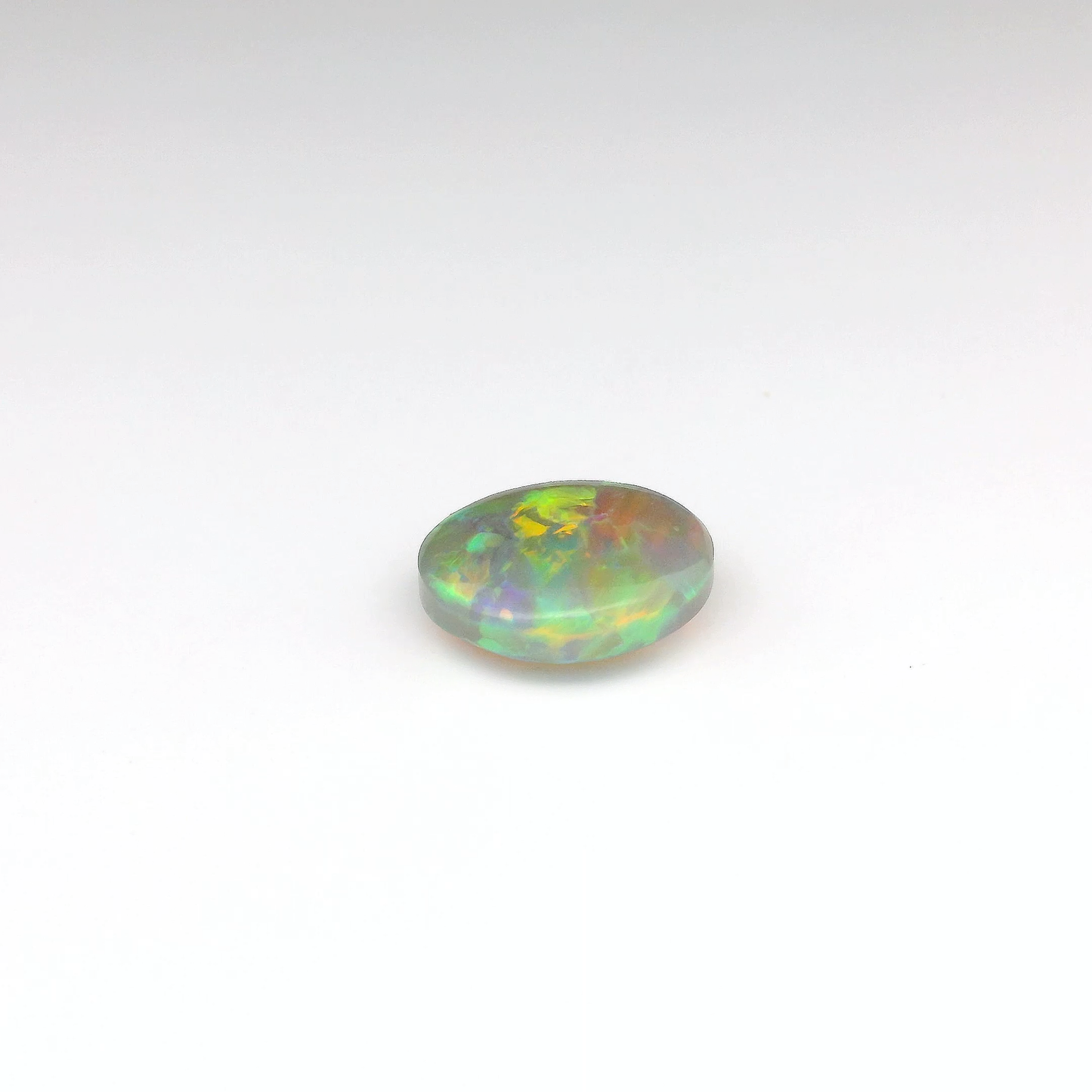 3.55ct Green, Orange Opal Gemstone