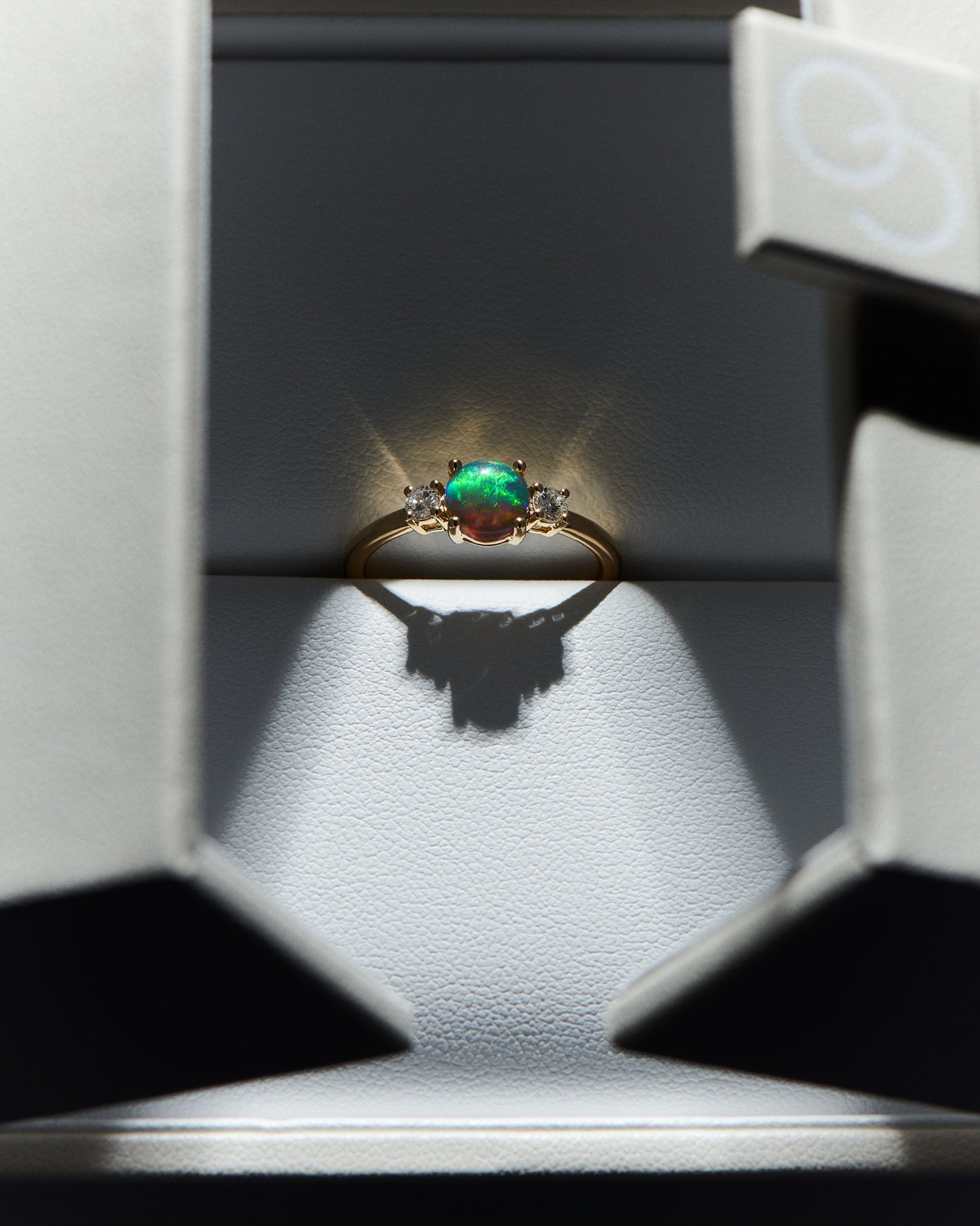 0.81ct Red, Green Opal Ring