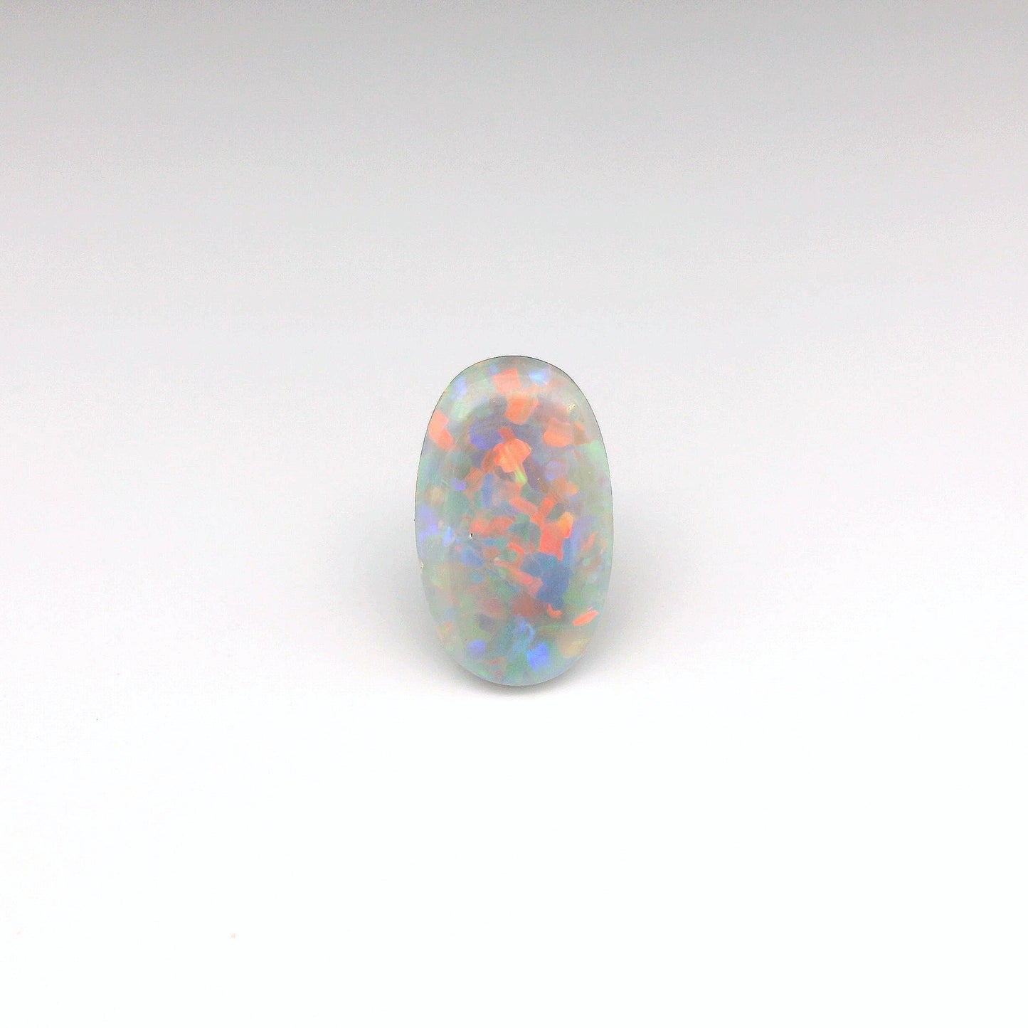 0,52 ct de pierre précieuse opale rouge et verte