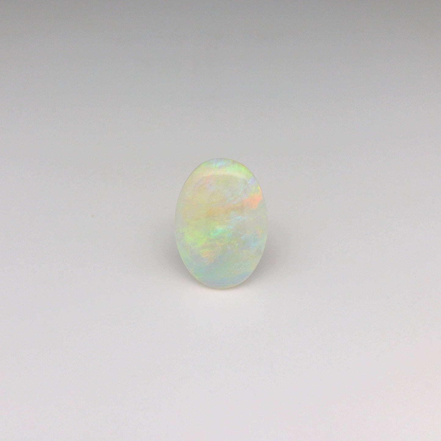 3.21ct Orange, Green Opal Ring