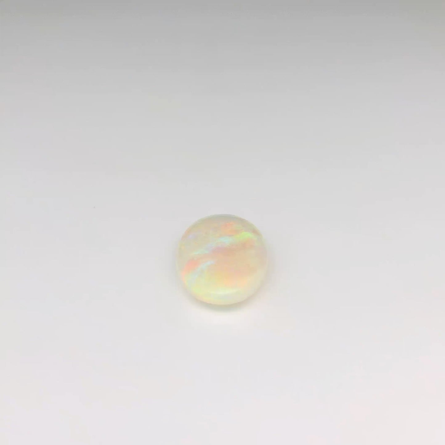 3.21ct Orange, Green Opal Ring