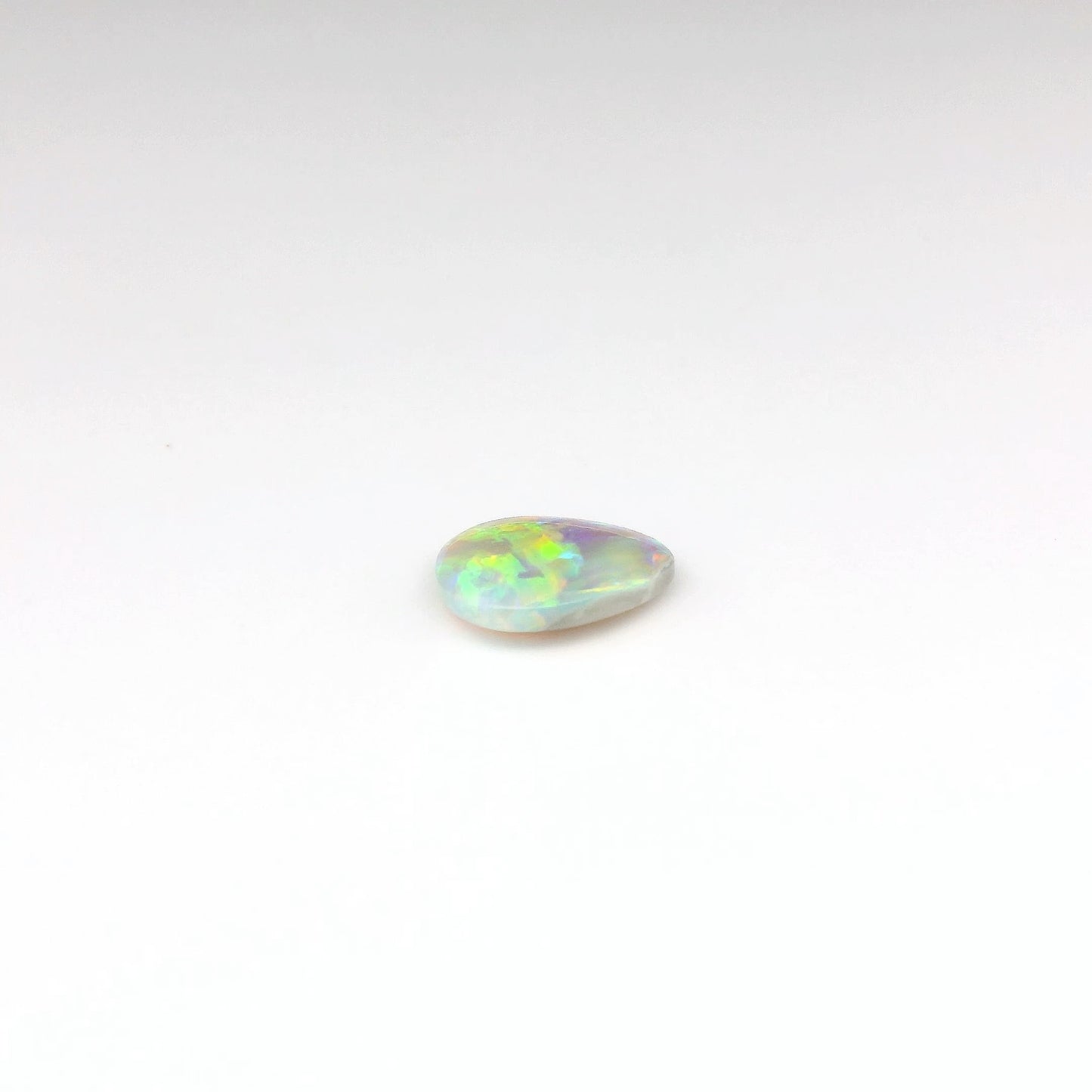 1.12ct Orange, Green Opal Ring
