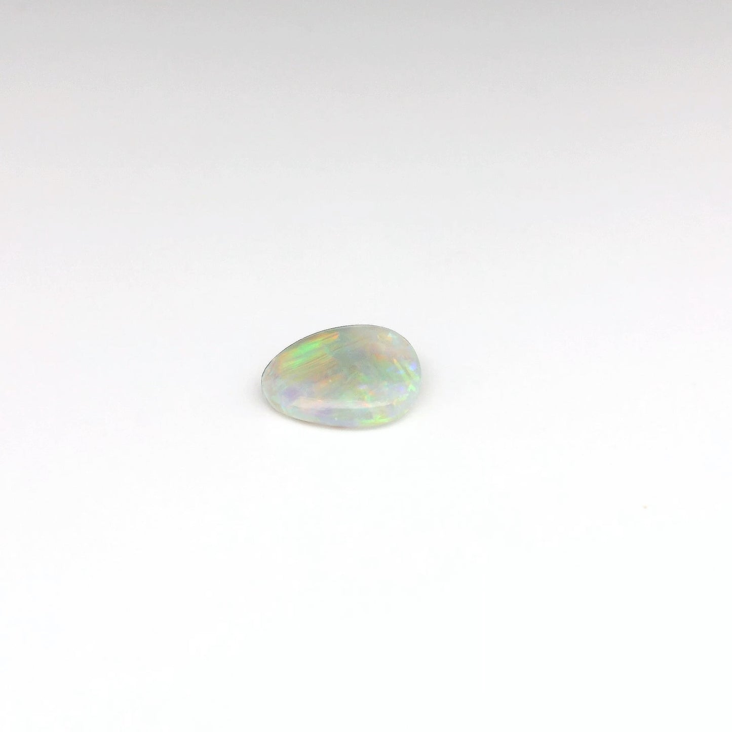 1.12ct Orange, Green Opal Ring
