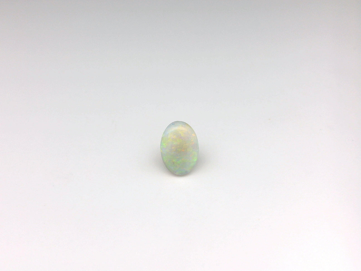 Bespoke 0.80ct Green, Orange Opal Ring